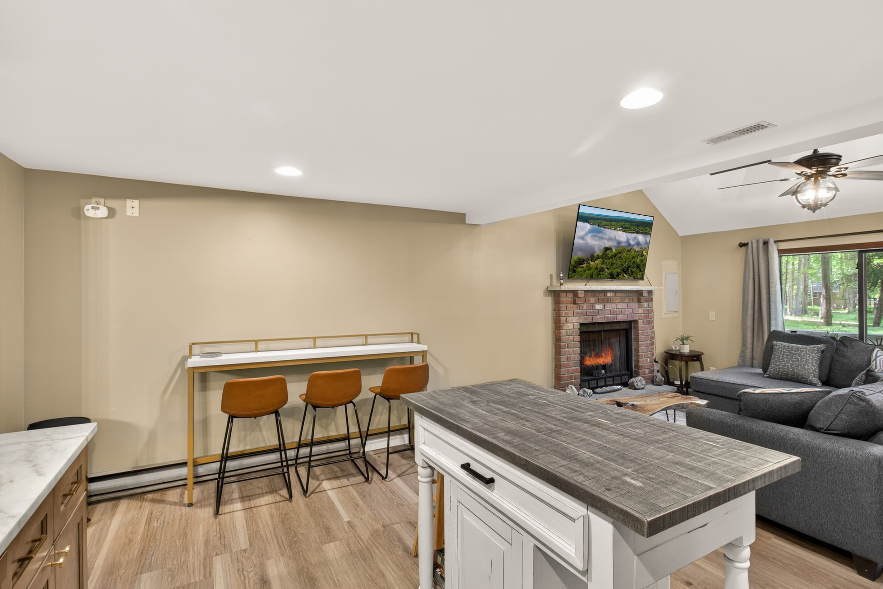 Kitchen area with island and side seating