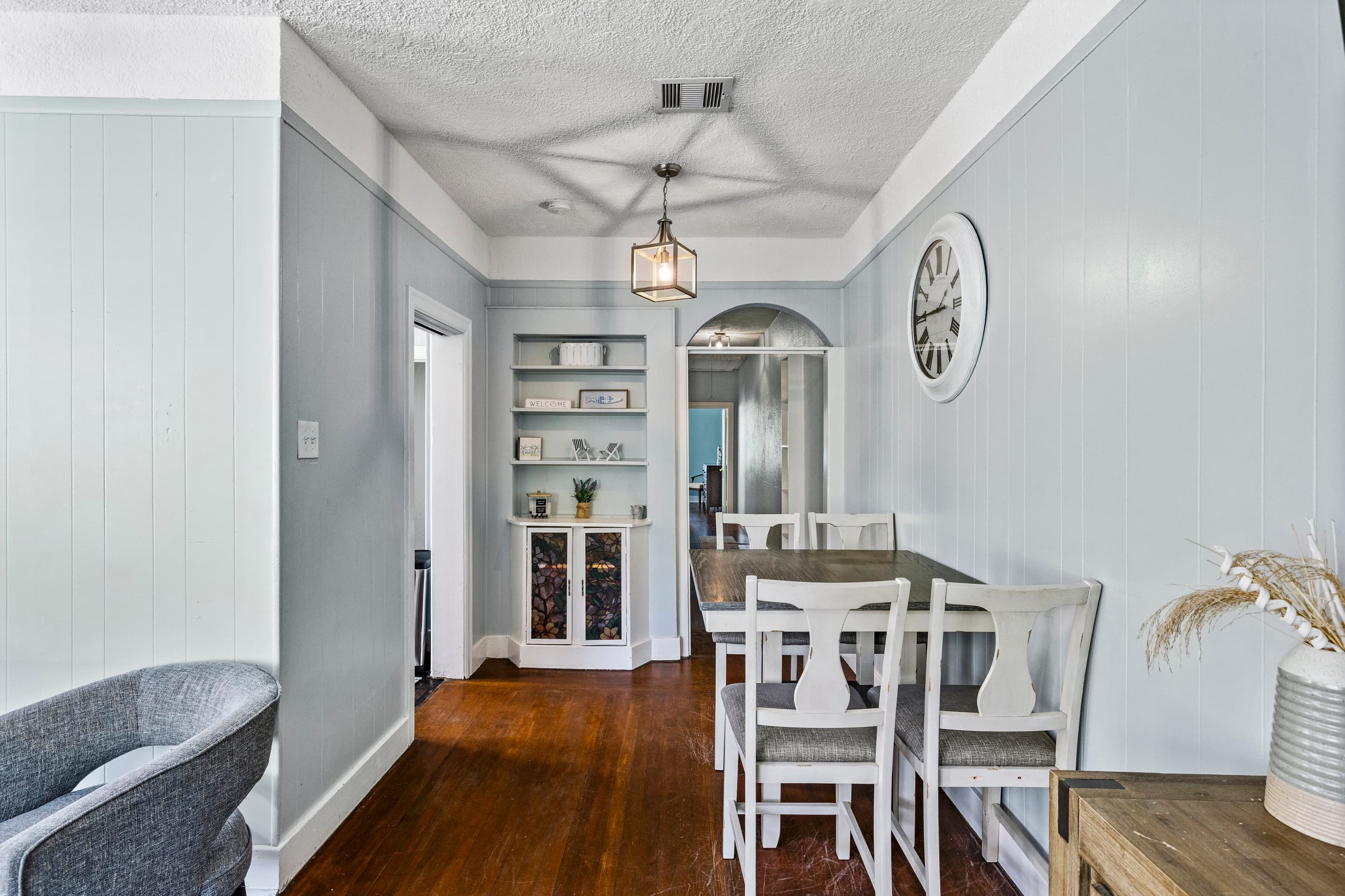 Gather around the dining table for a shared meal — Port Side at M seats the group comfortably just off the kitchen.