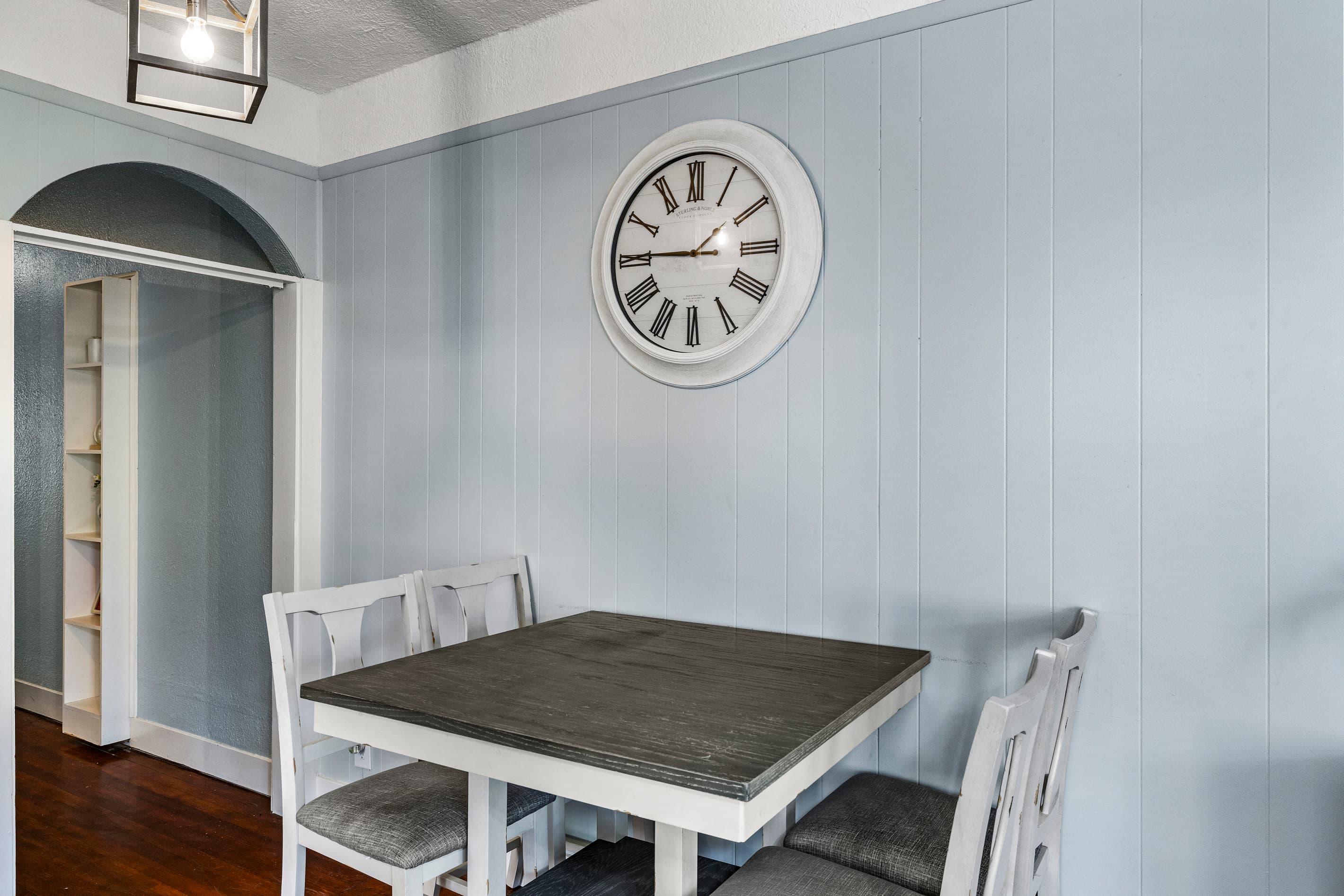 The dining area sits between the kitchen and living room — an easy, connected layout for meals together.