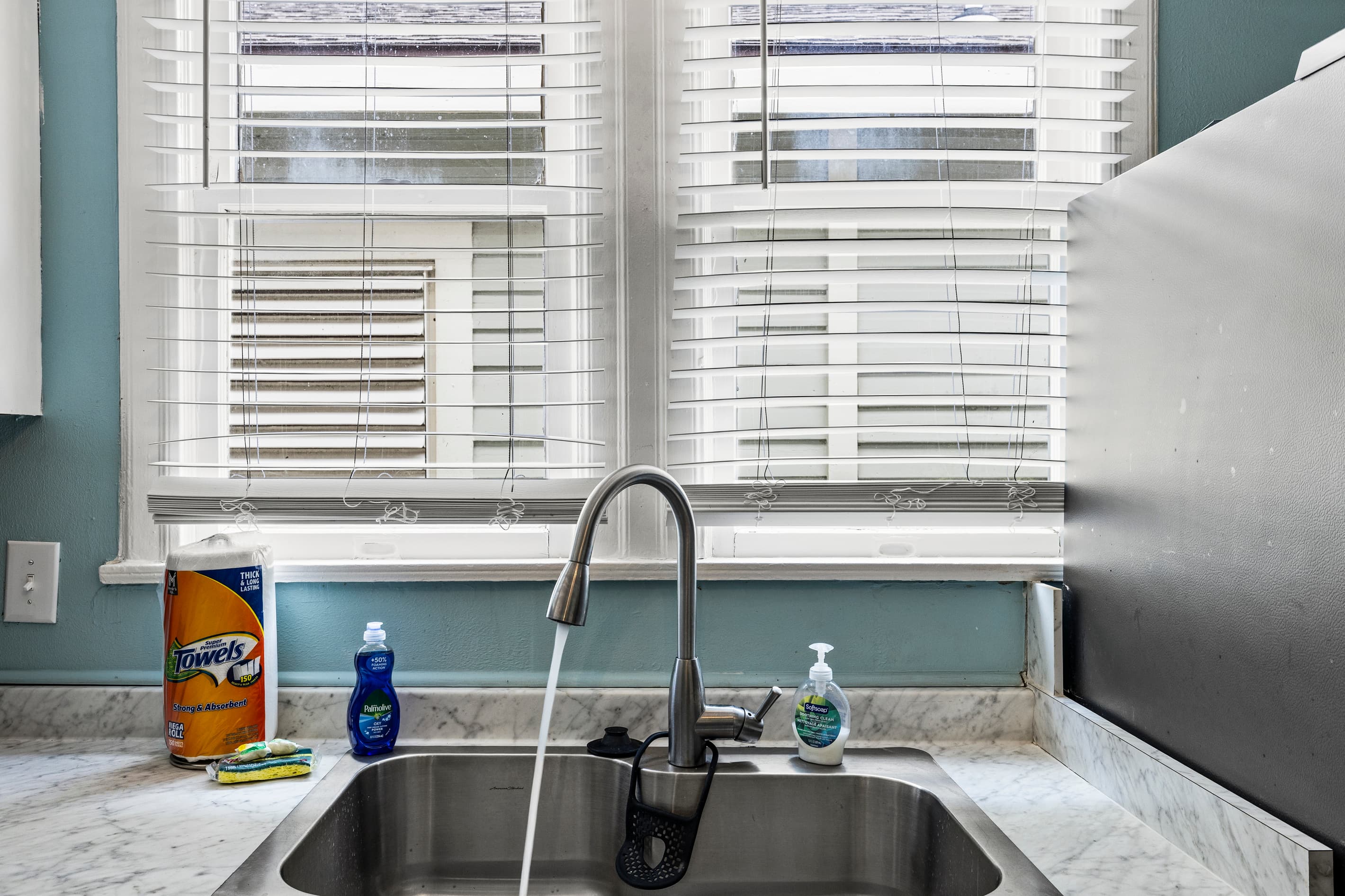 Double sink and ample counter space make cleanup easy — everything you need is close at hand.