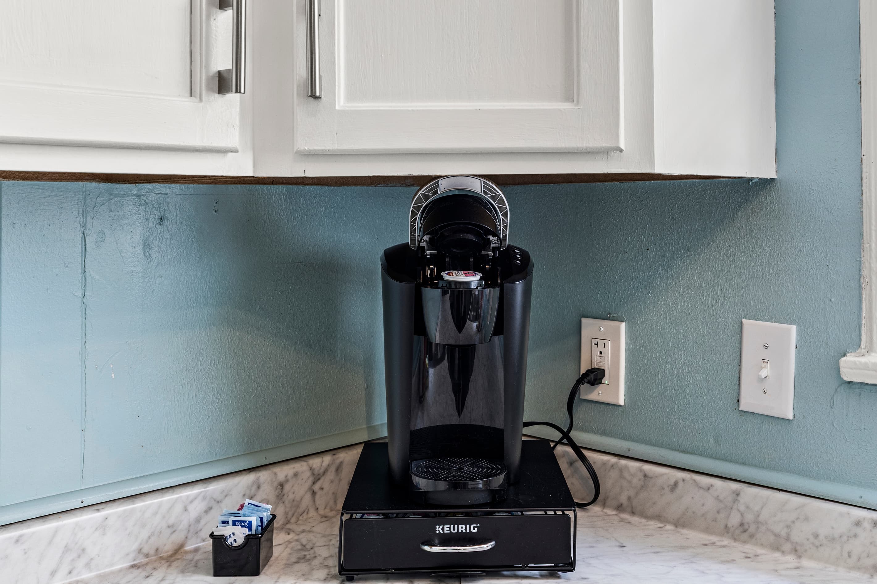 Start every Galveston morning right — the kitchen comes stocked with a Keurig coffee maker and an assortment of K-cups.