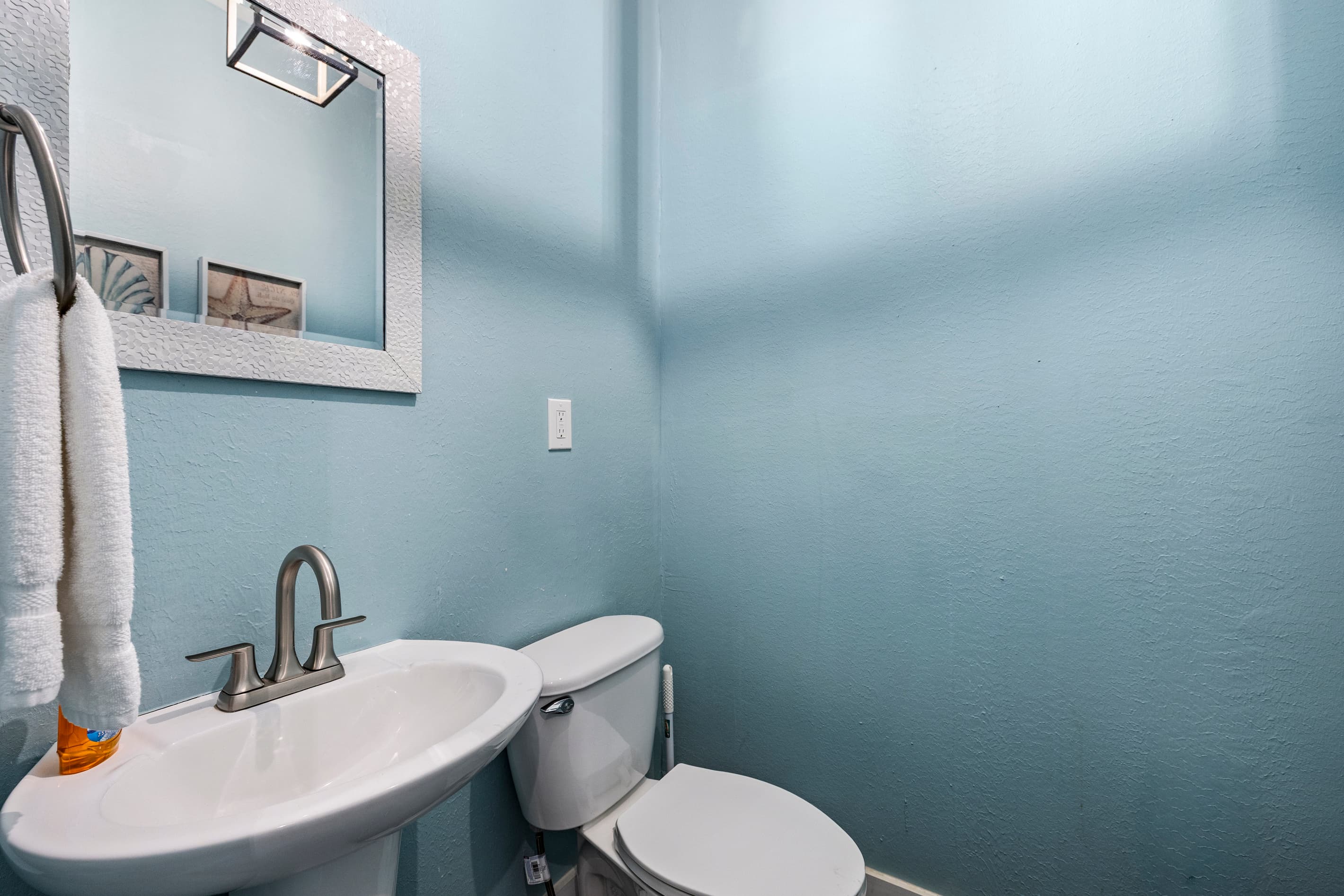 A convenient half bath keeps the morning routine moving for the whole group.