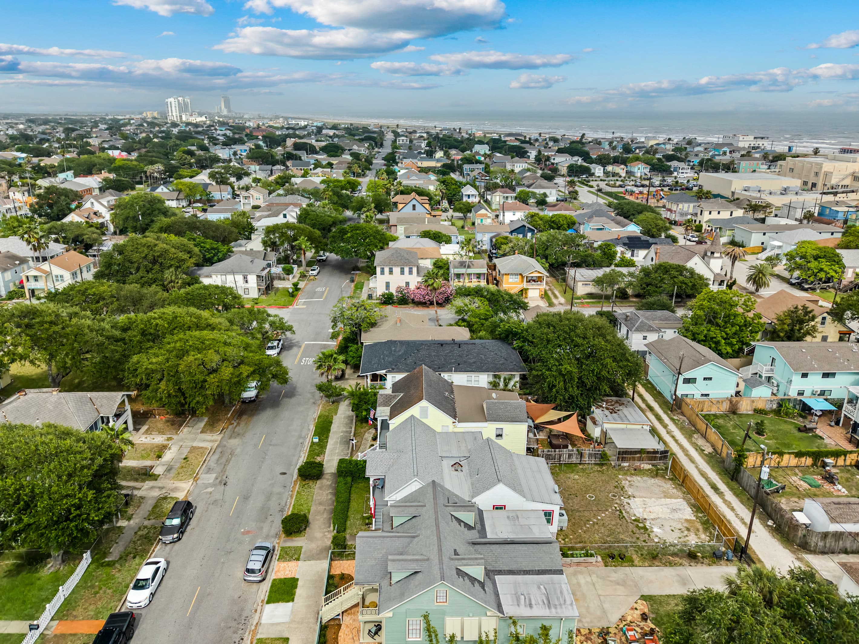 The wider Lost Bayou neighborhood from above — one of Galveston's most walkable, character-rich districts.