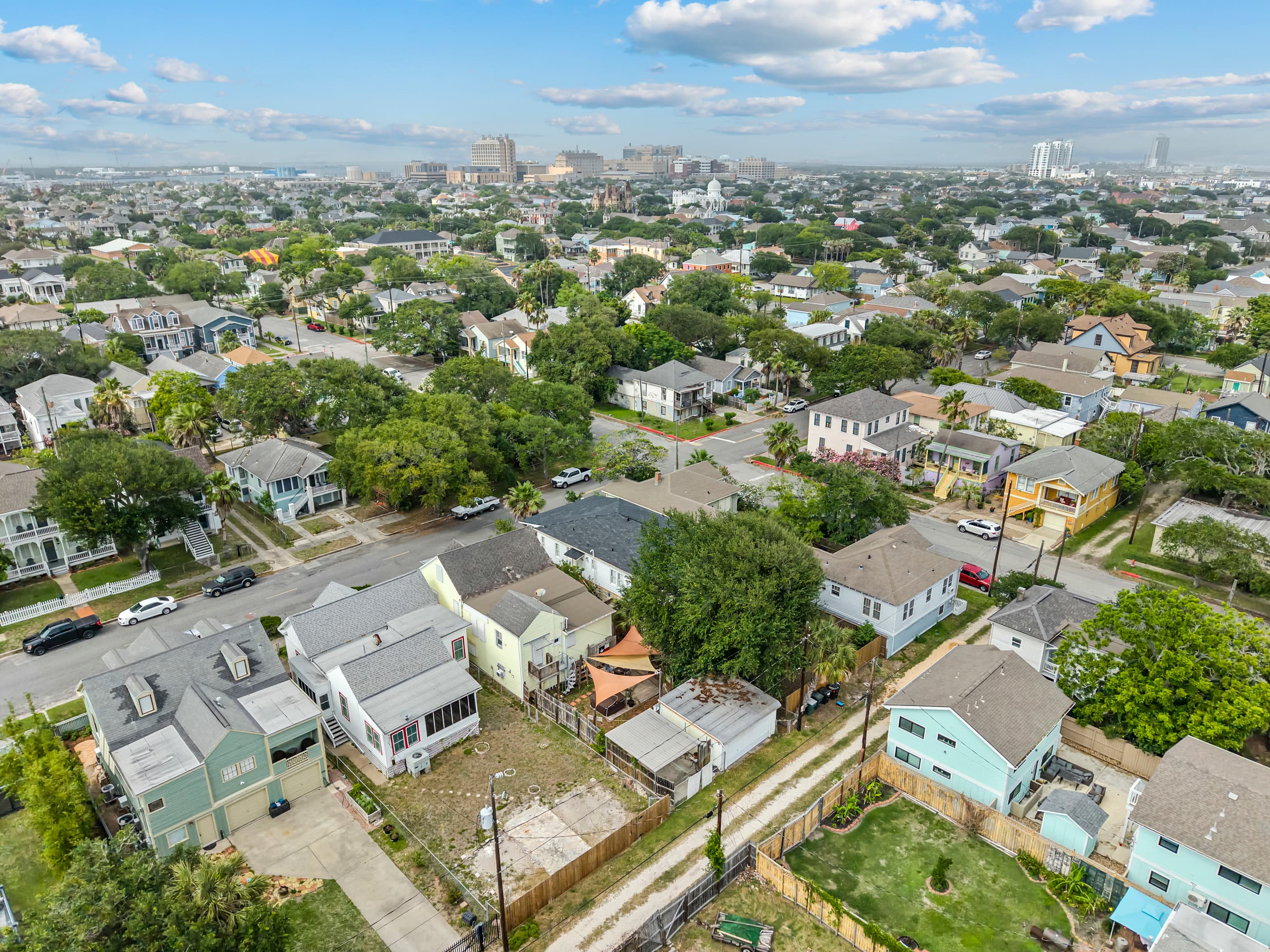 Galveston's iconic street grid from the air — Port Side at M sits right in the heart of it, minutes from the Gulf.