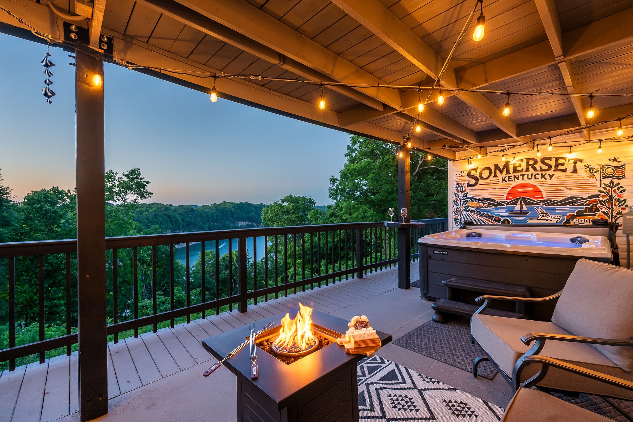Soak in the hot tub beside the fire table while enjoying peaceful lakeview sunsets. 