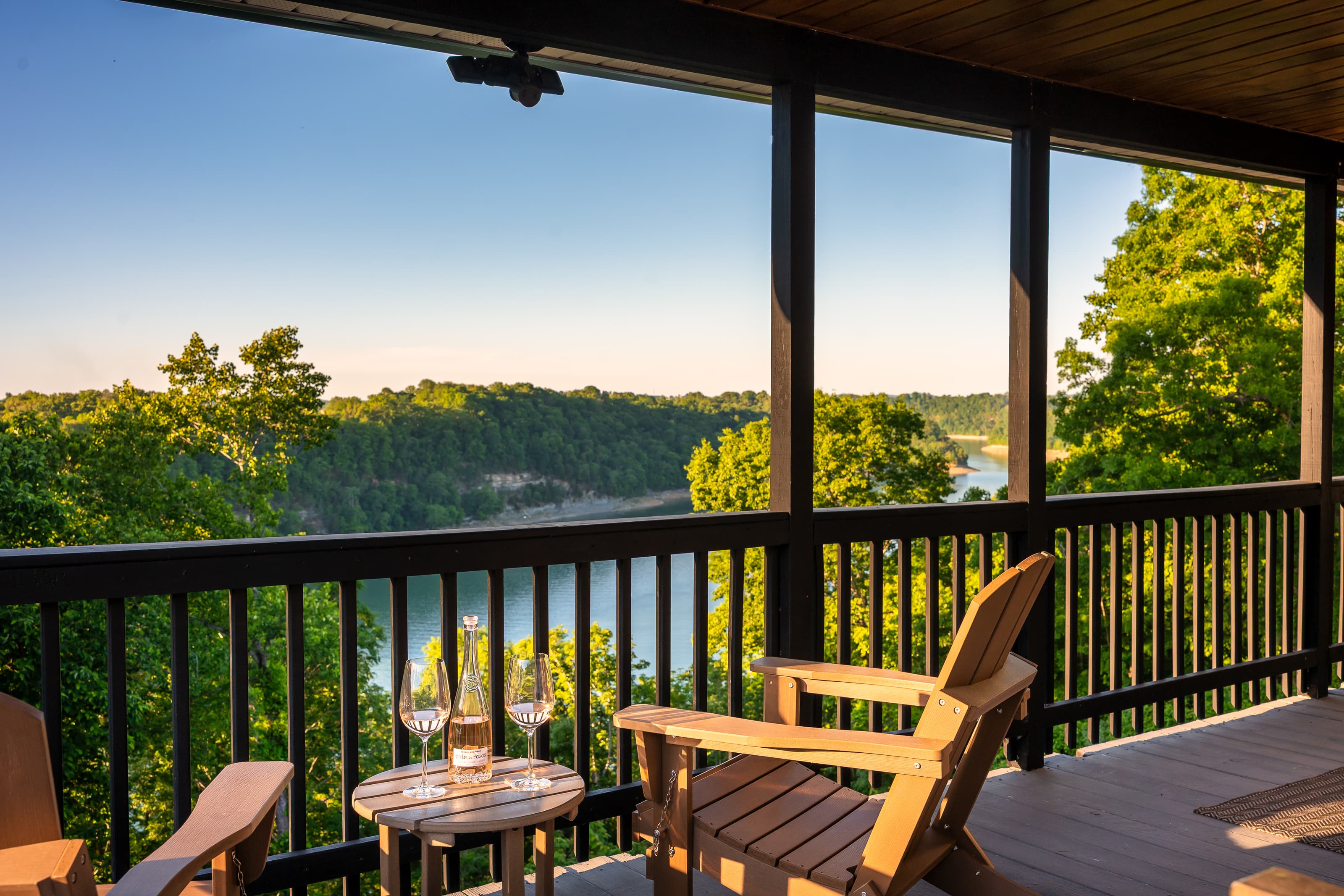 Expansive upper deck with panoramic lake views perfect for morning coffee or evening wine.