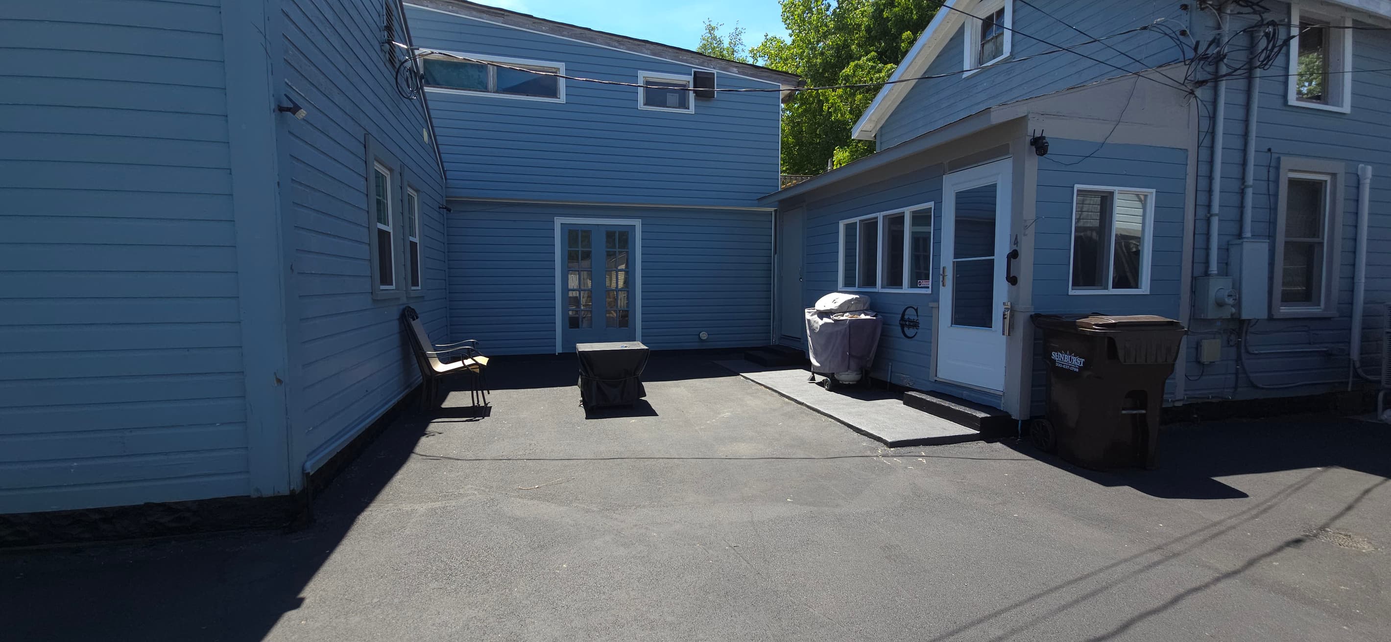 The patio includes two outdoor chairs, a gas fire pit, and a gas grill for relaxing and cooking outdoors. If you need additional fuel during your stay, extra propane tanks are available for $30.