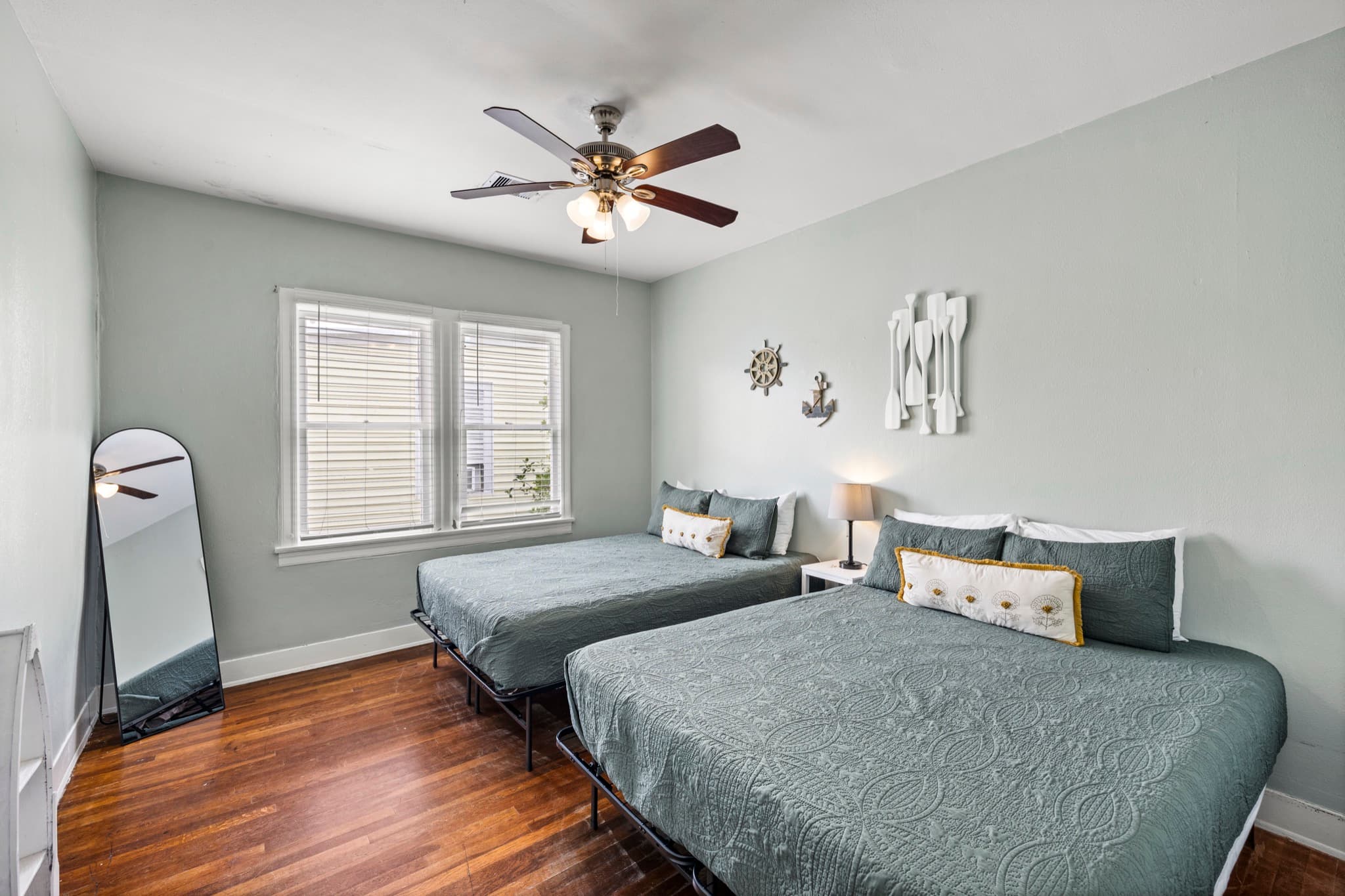 Starboard at M (Upper Right) — the second bedroom with two queen beds, sleeping four more of your group.