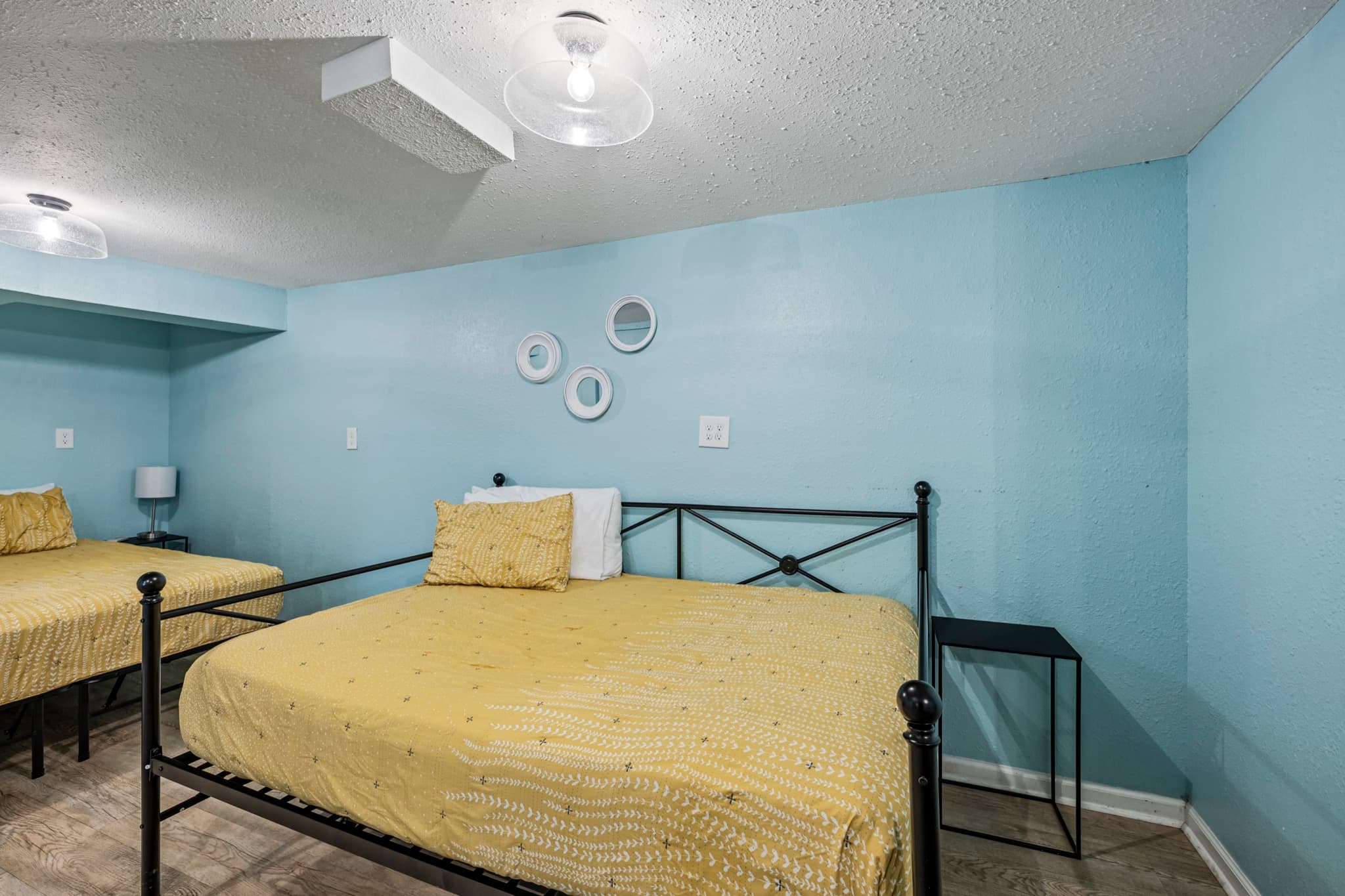 Historic Anchor at M (Studio) — multiple beds (two queens, a full, and a twin trundle) sleep your overflow comfortably.