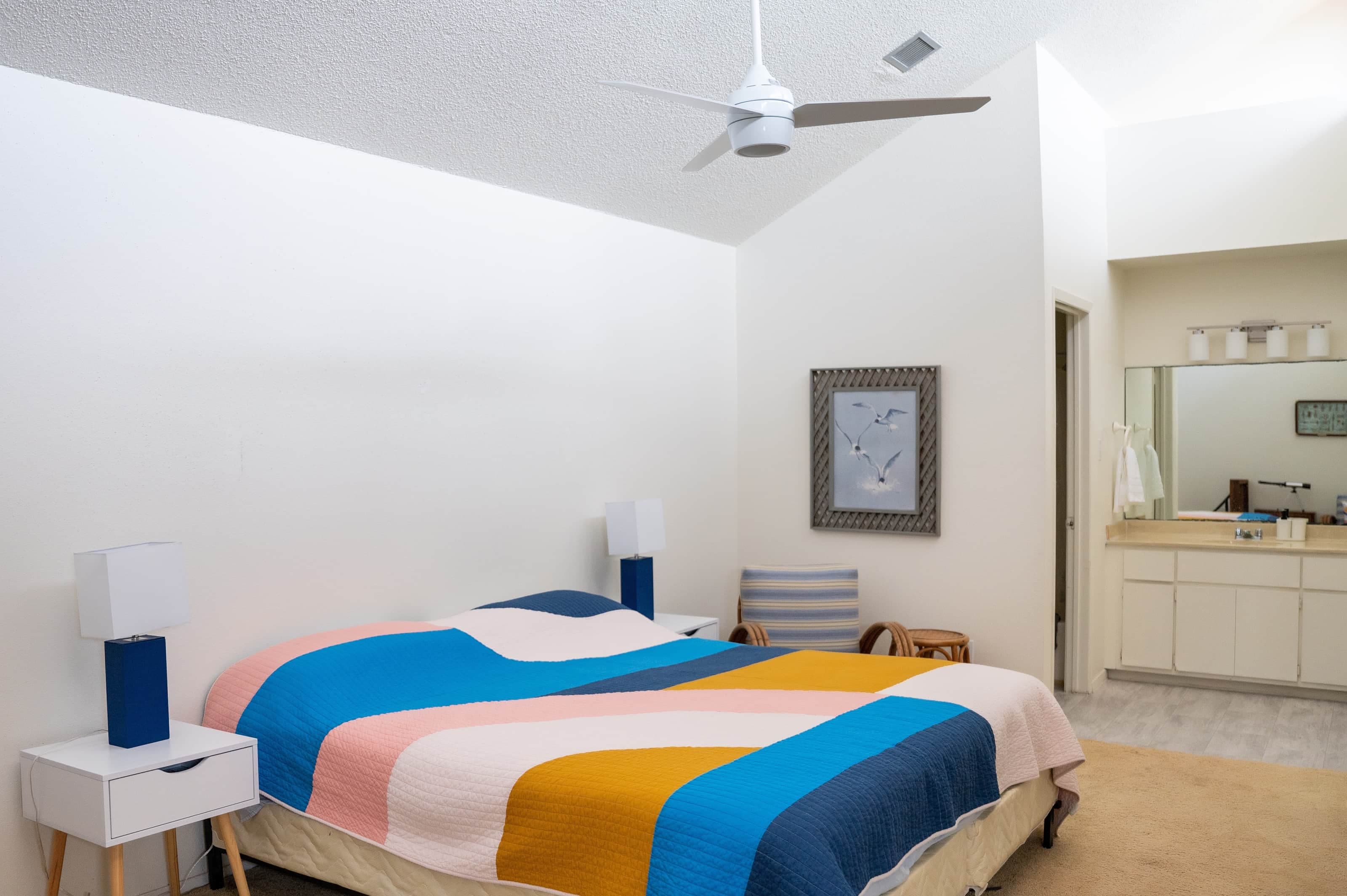 Master bedroom with king-sized bed & USB charger lamps