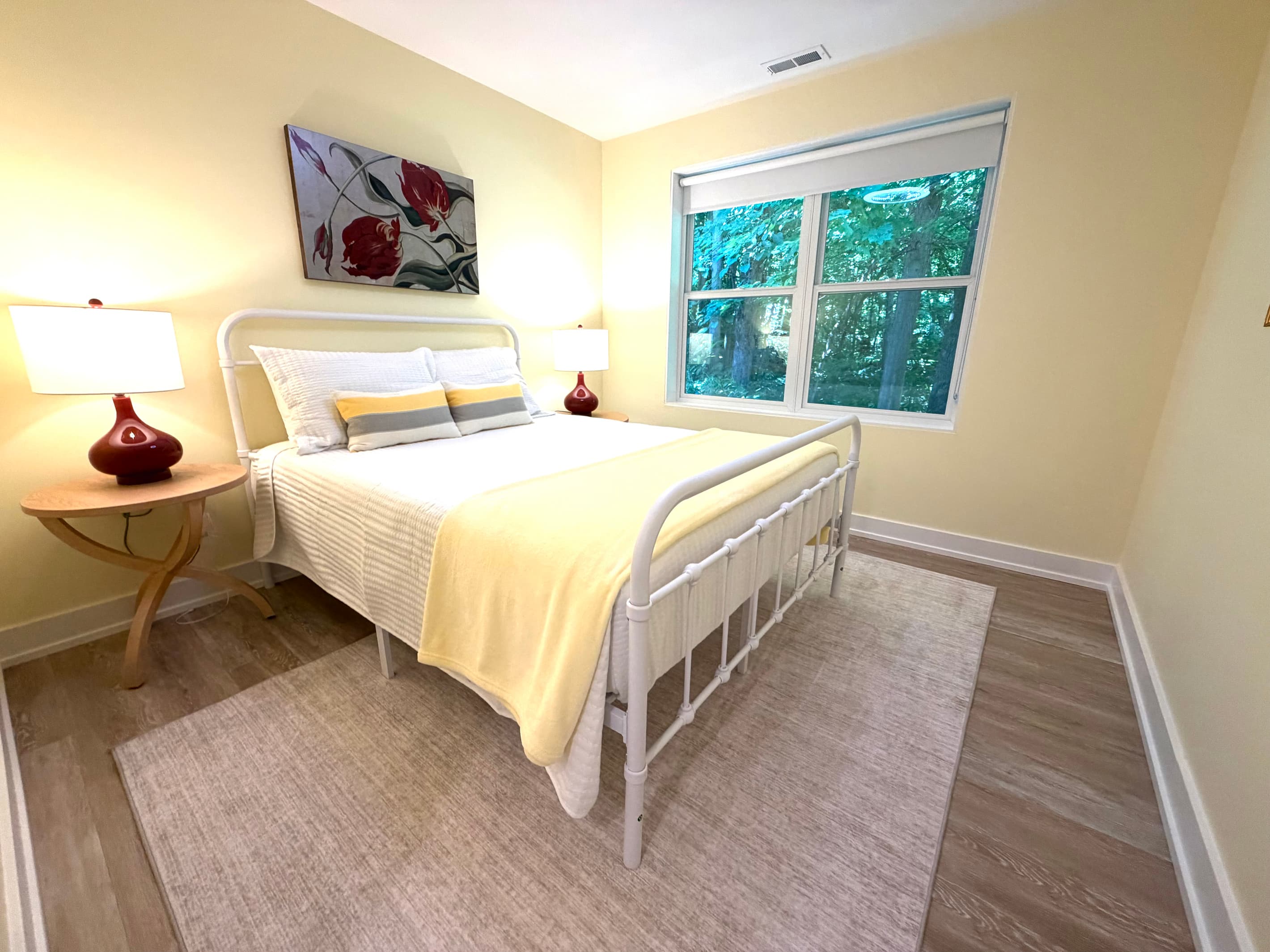 Bedroom Five has a queen bed overlooking the ravine.