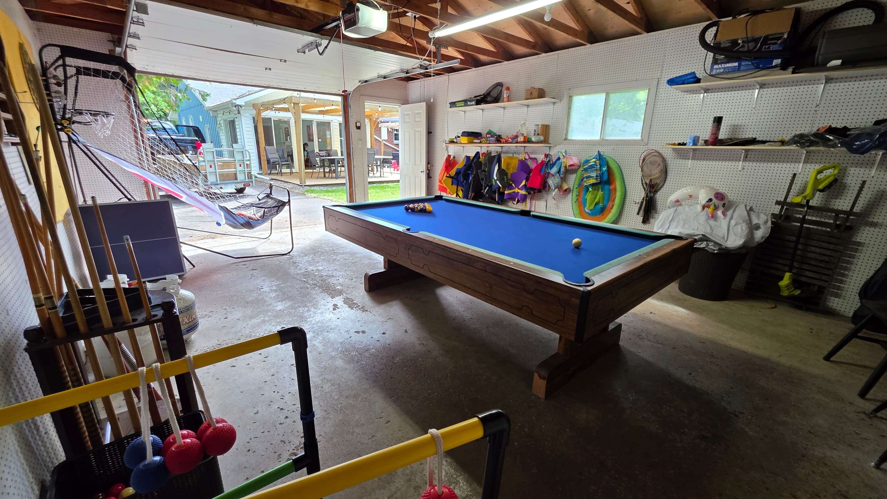 Game Room: Darts, Pool, Basketball Shooter, life jackets, outdoor games (badminton, Boche ball, lawn darts, cornhole, croquet, and more!). Not Temperature Controlled. 