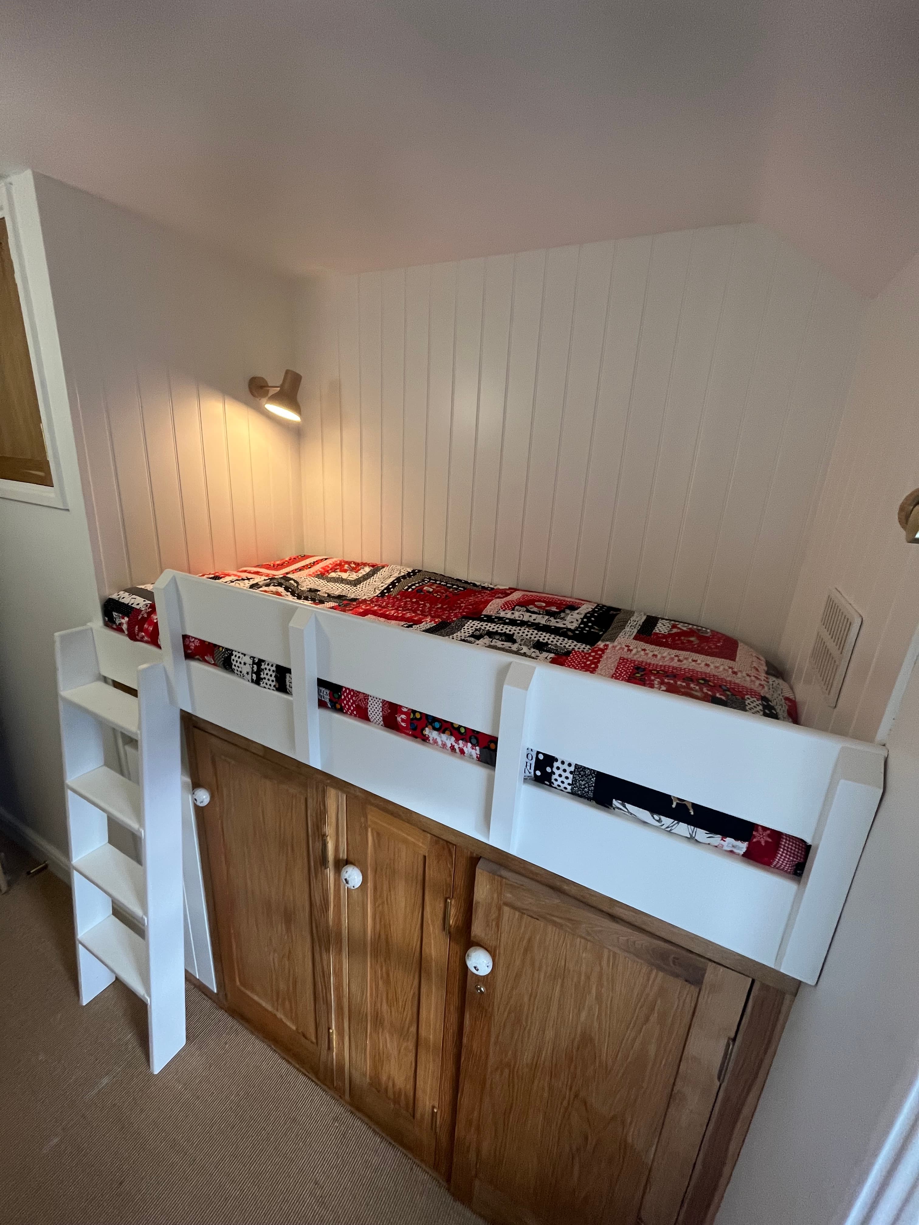 Walk through room with cabin bed and work space 