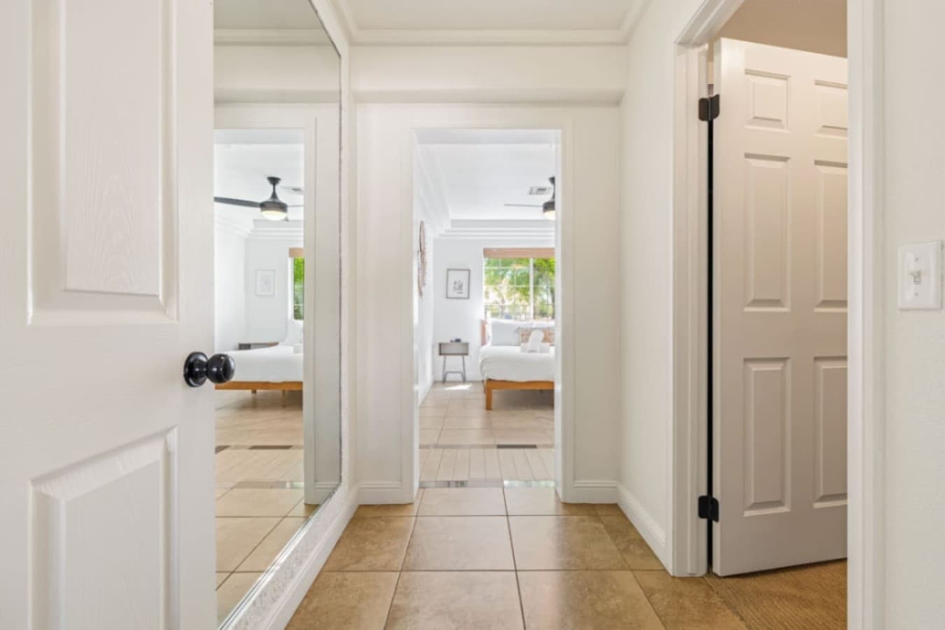 Hallway view connecting bedrooms & common spaces, keeping the layout open & easy to navigate.