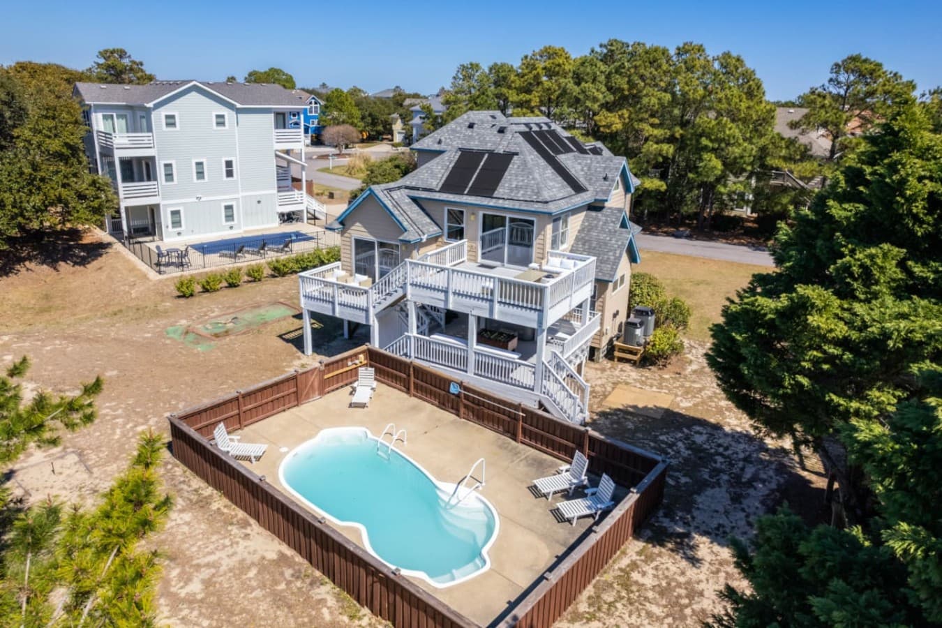 Aerial view highlighting the private pool & spacious outdoor setup.