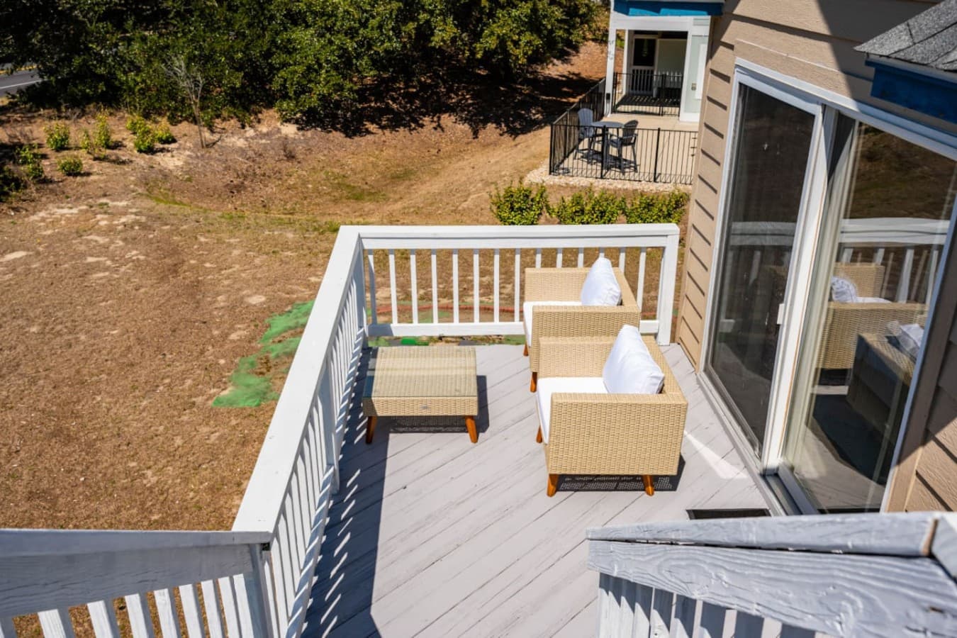 Small deck seating area perfect for quiet coffee breaks or fresh-air lounging.