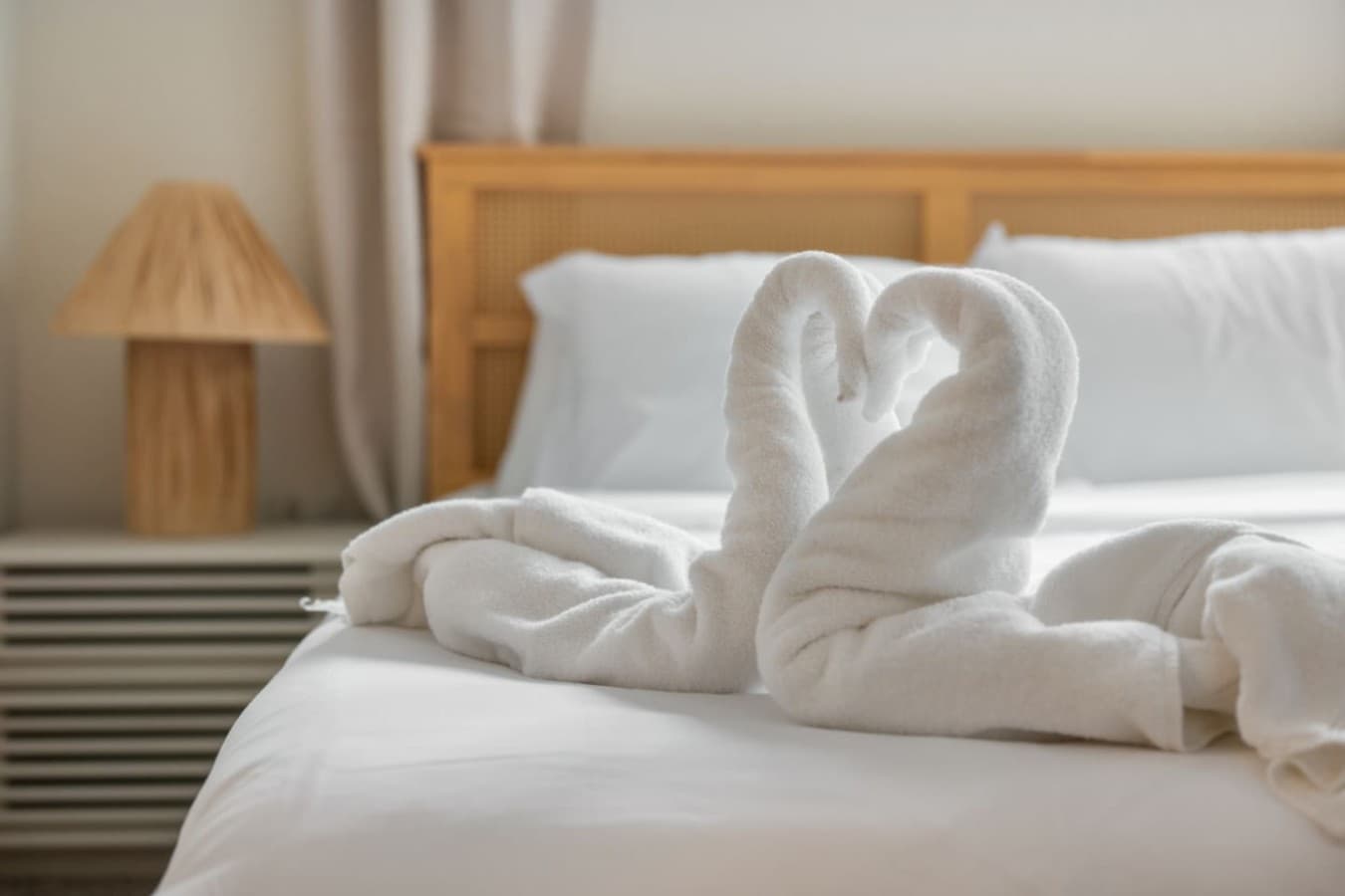 Thoughtful towel details add a welcoming touch to the bedroom.