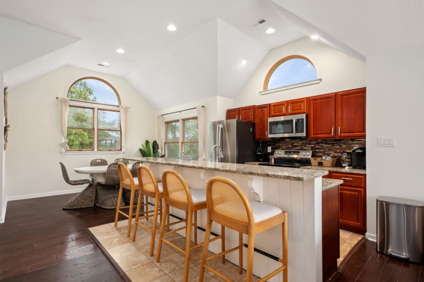 Open kitchen & dining area set up for shared meals & easy conversation.