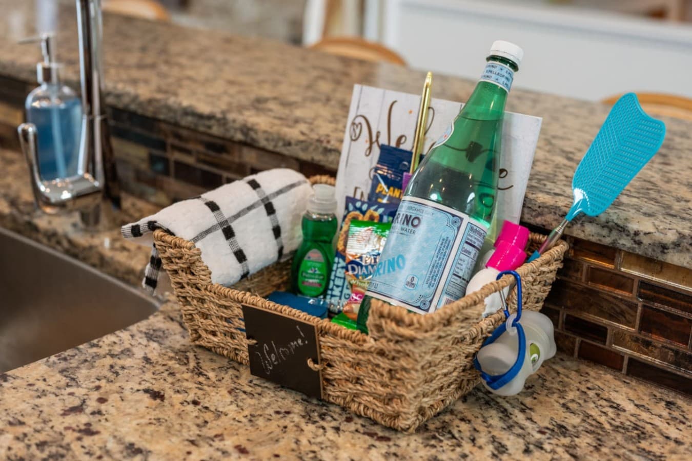 Welcome basket on the granite counter w/ snacks, drinks & first-night essentials.