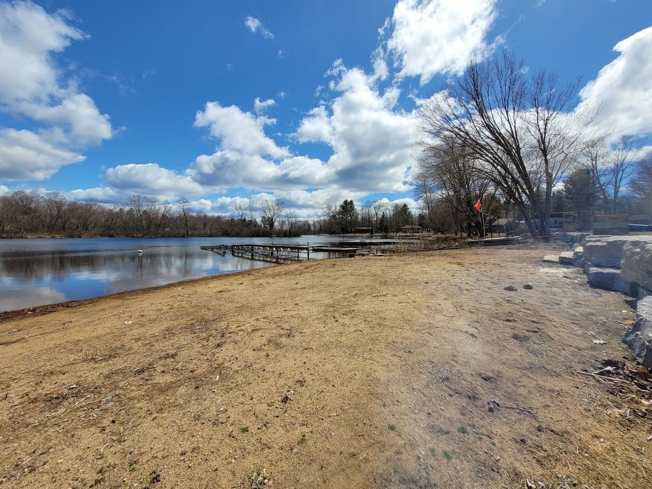 Beach area, shallow entry to water.