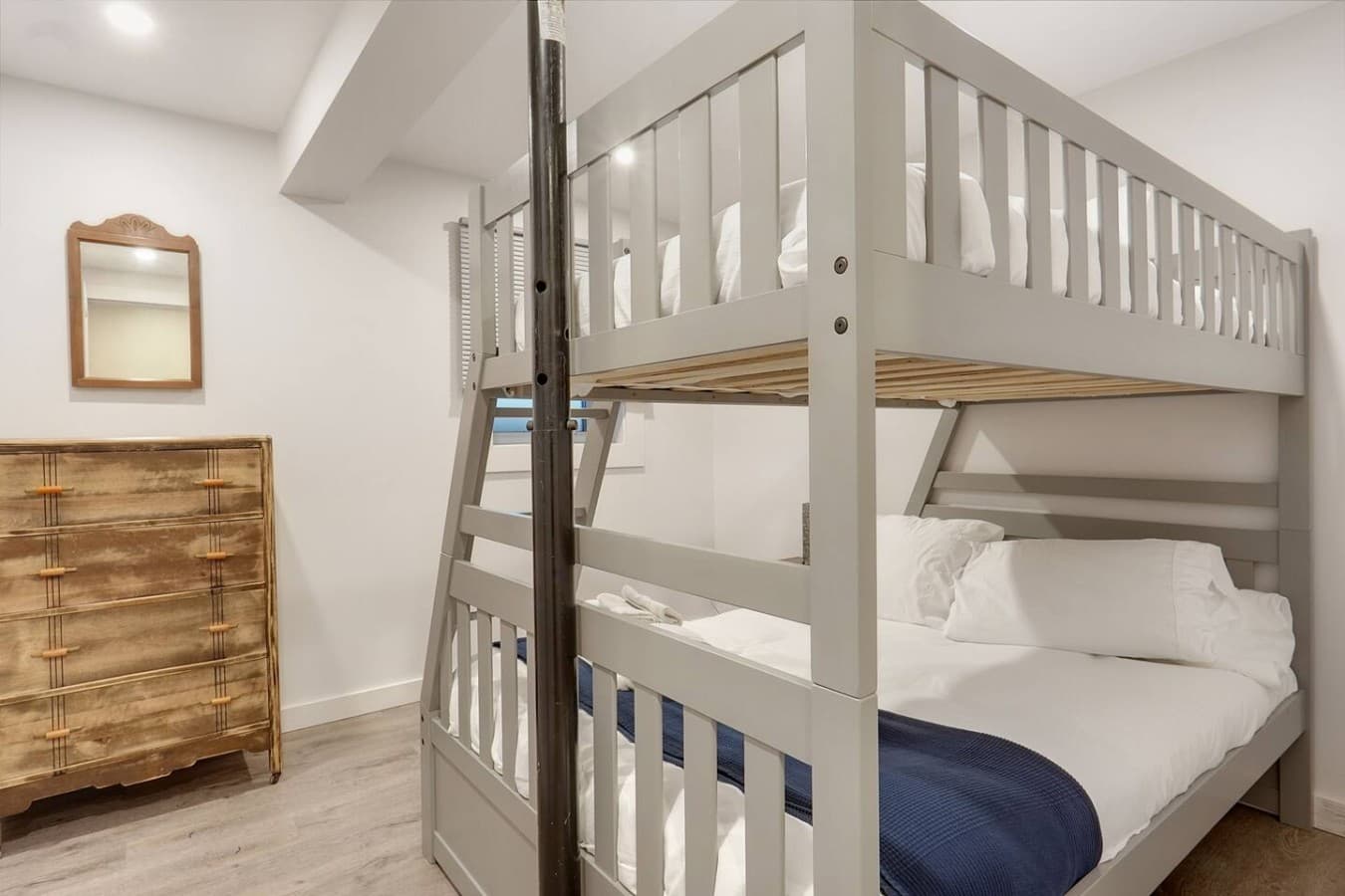 Bedroom 3 situated in main cottage basement. Bunk bed is a single over double