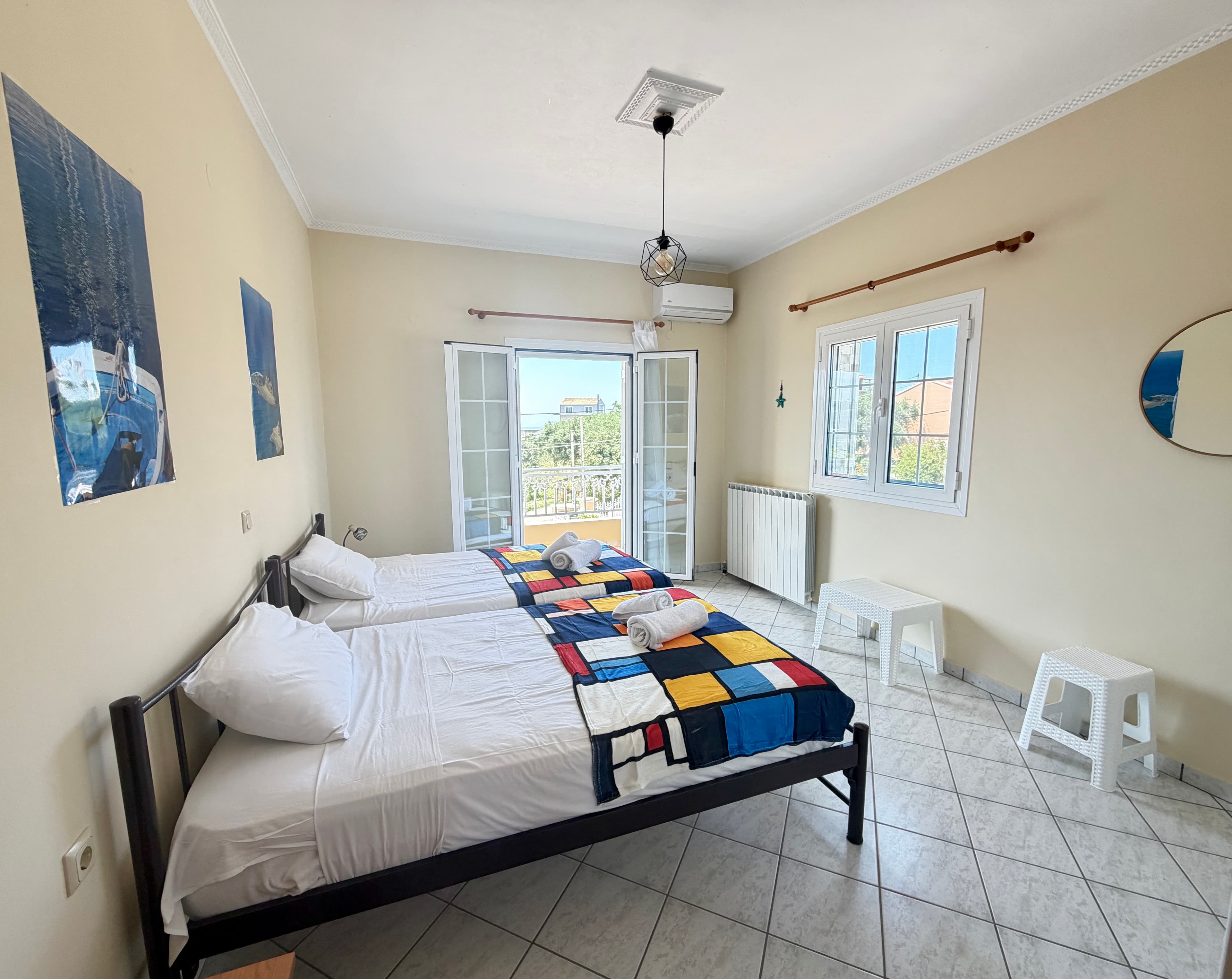 Double bed upstairs room with balcony and sea view