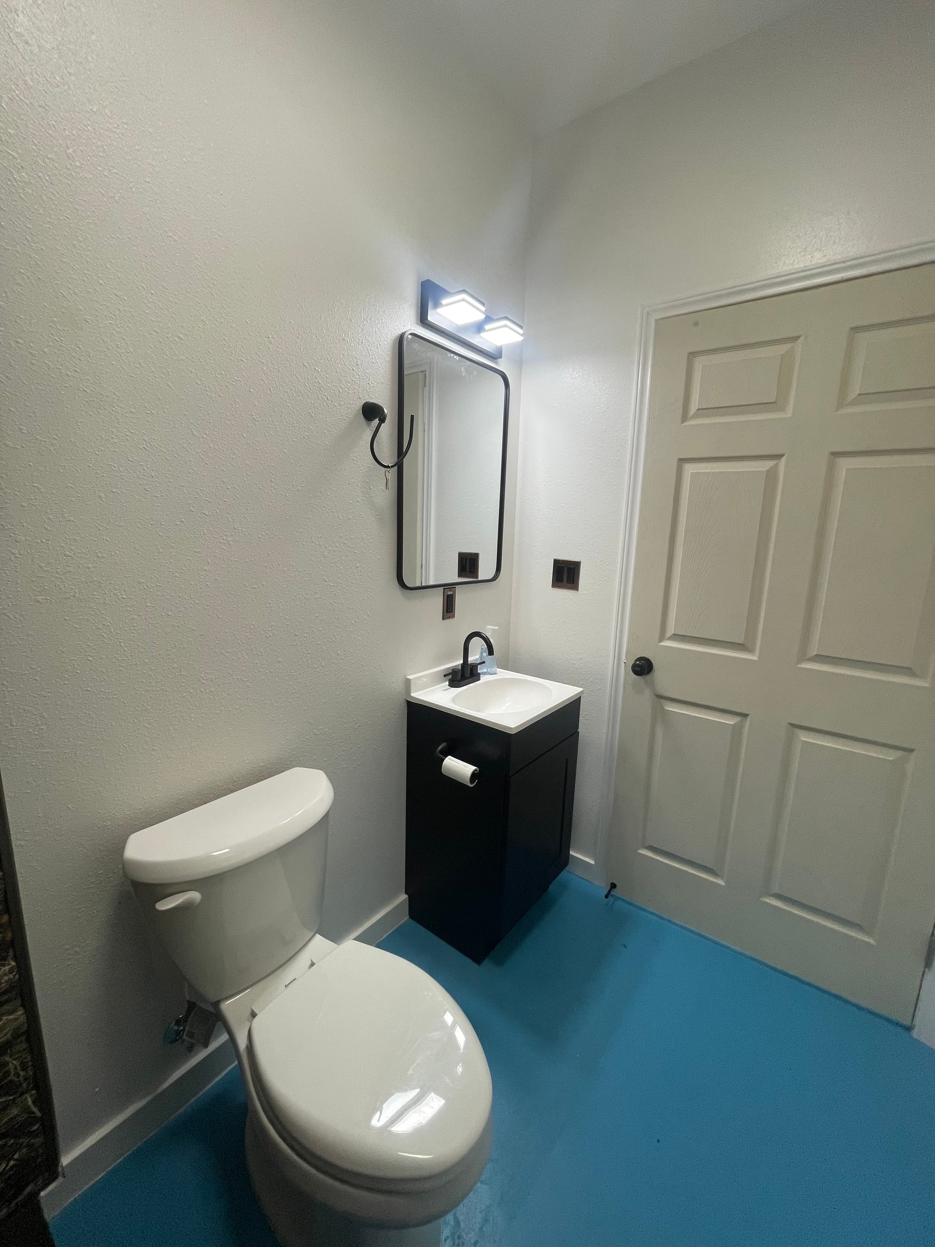 Shared bathroom and shower facilities.