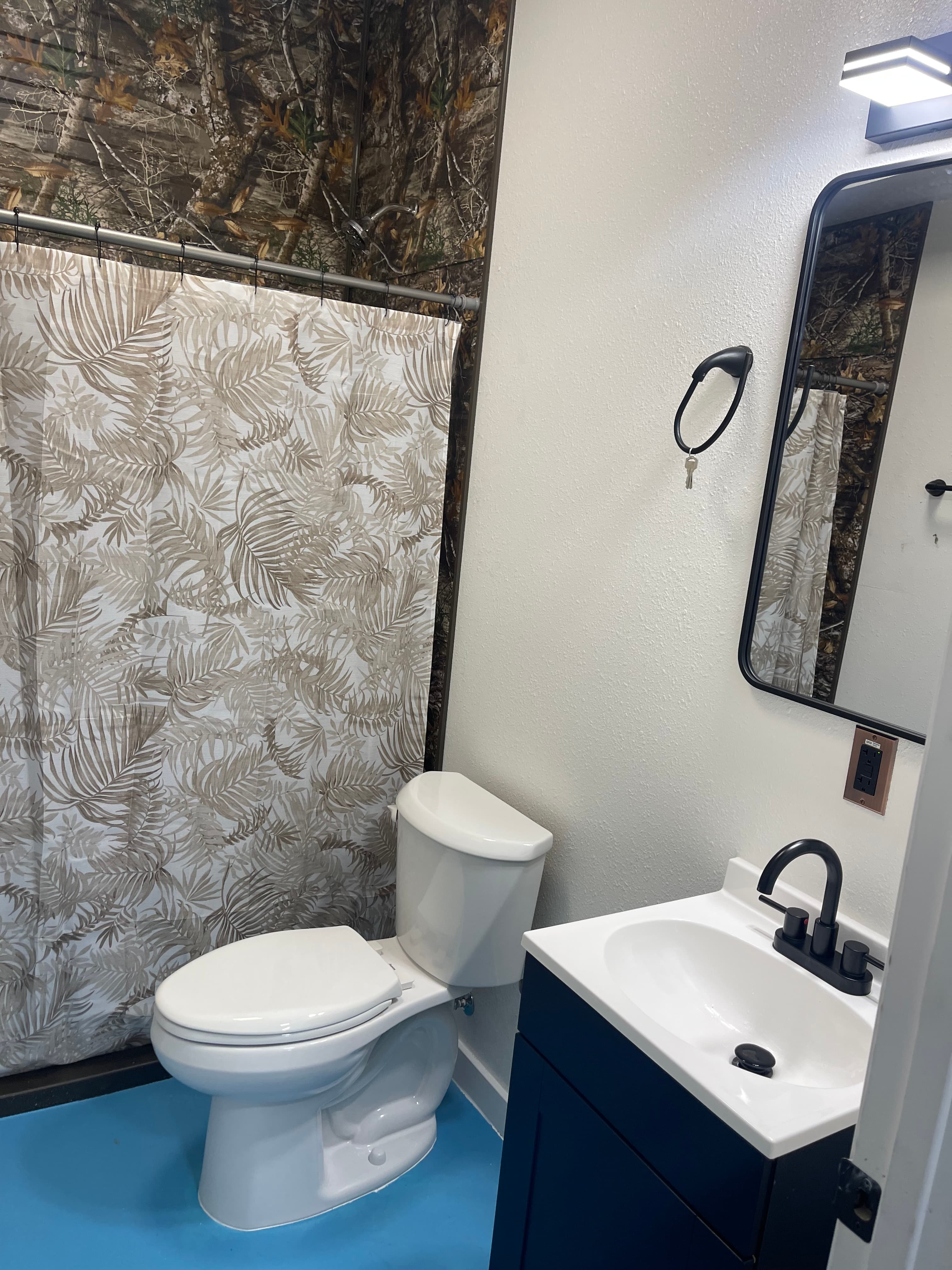 Shared bathroom and shower facilities.