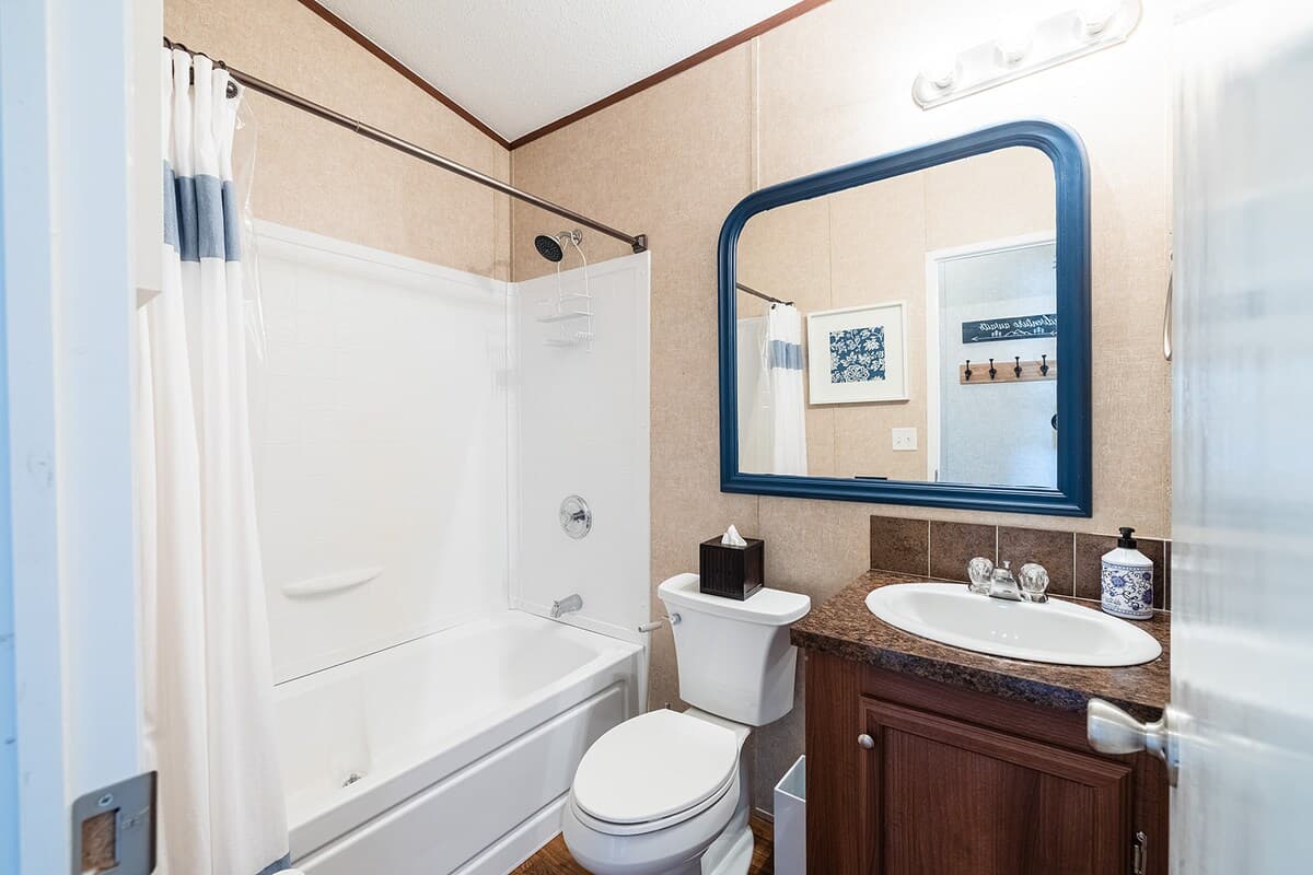 Shared full bath for both bedrooms—clean, convenient, and stocked with essentials for a comfortable stay.