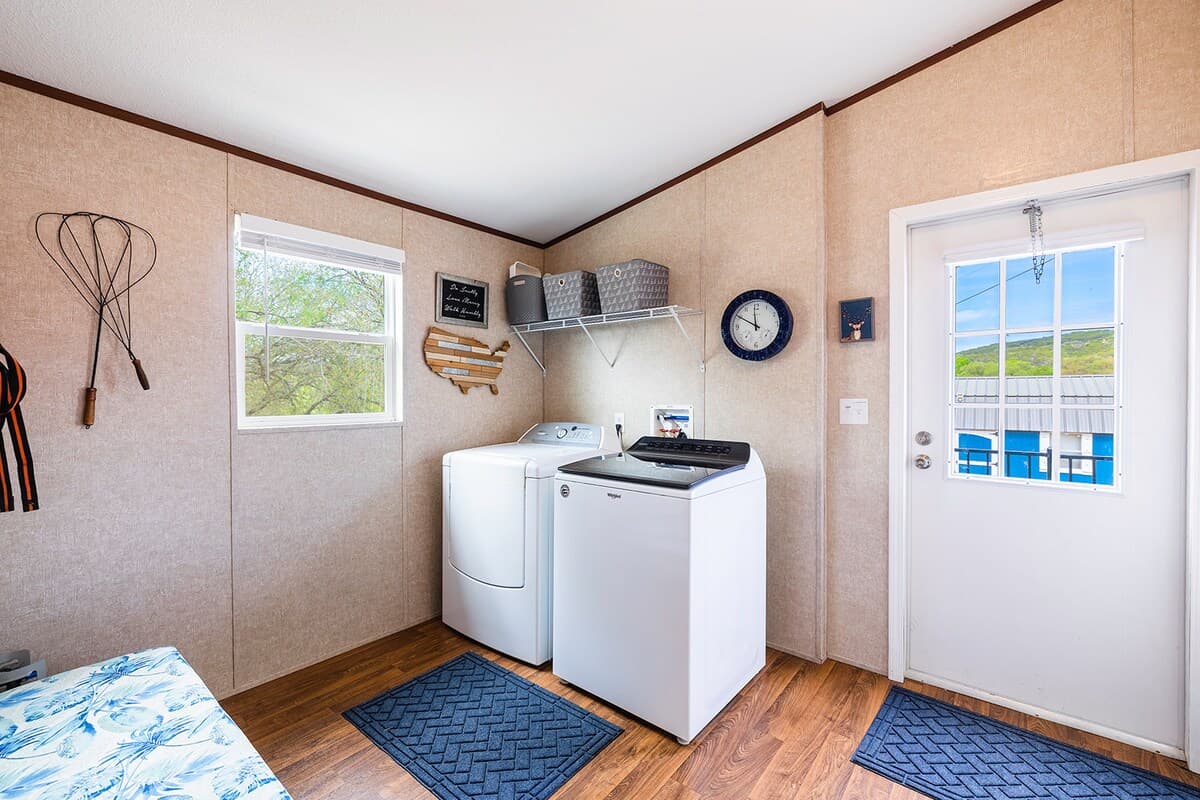 Full laundry room with washer, dryer, and essentials—perfect for extended stays and family trips.