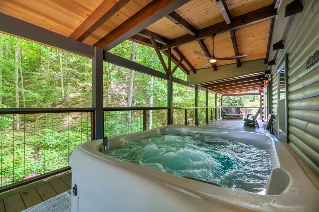 The ultimate mountain luxury: a warm soak under the vast Smoky Mountain sky.