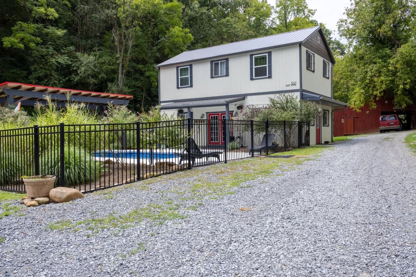Rustic Curb Appeal: The charming home with classic farmhouse architecture.