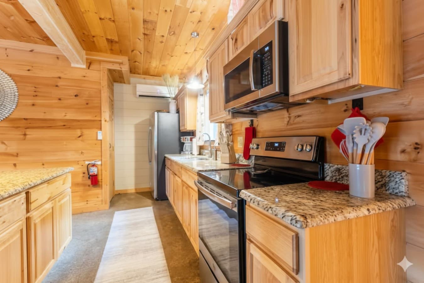 Gourmet Farmhouse Kitchen: A fully equipped culinary space featuring modern appliances and ample counter space.