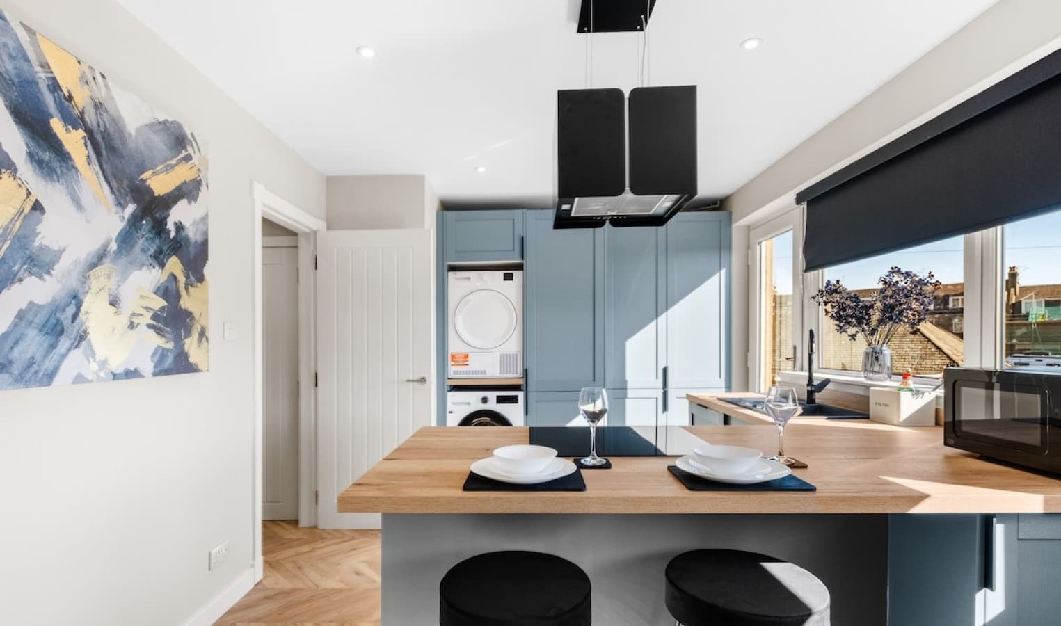 Kitchen island and range hood