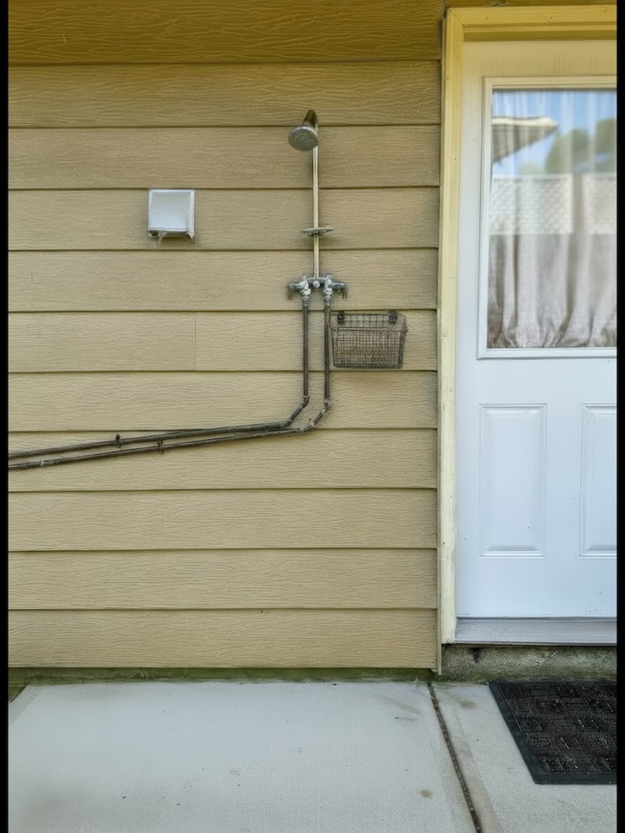 sandhill-flat-outdoor-rinse-shower.jpg