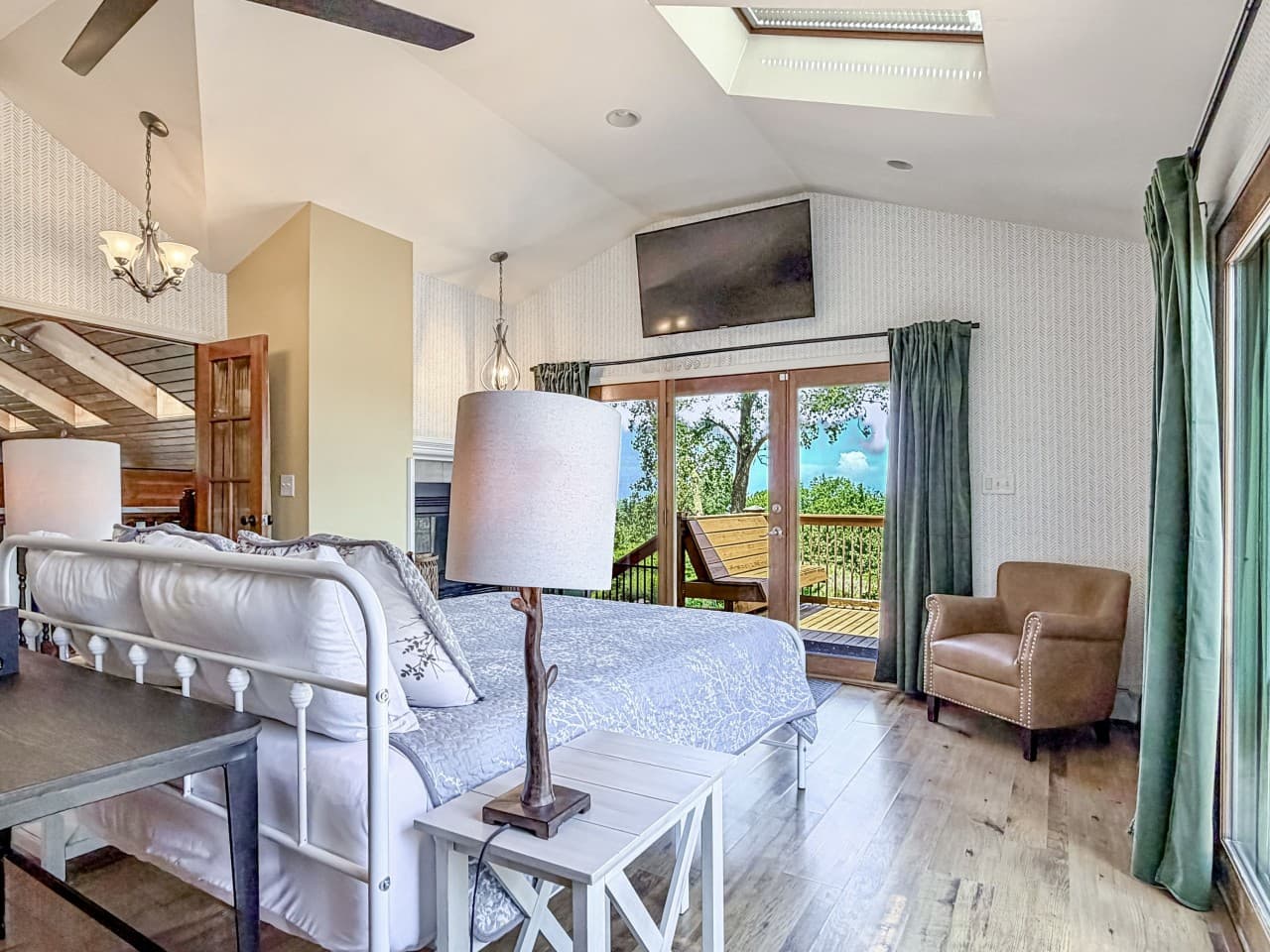 09-elyon-hall-primary-bedroom-private-deck-view.jpg