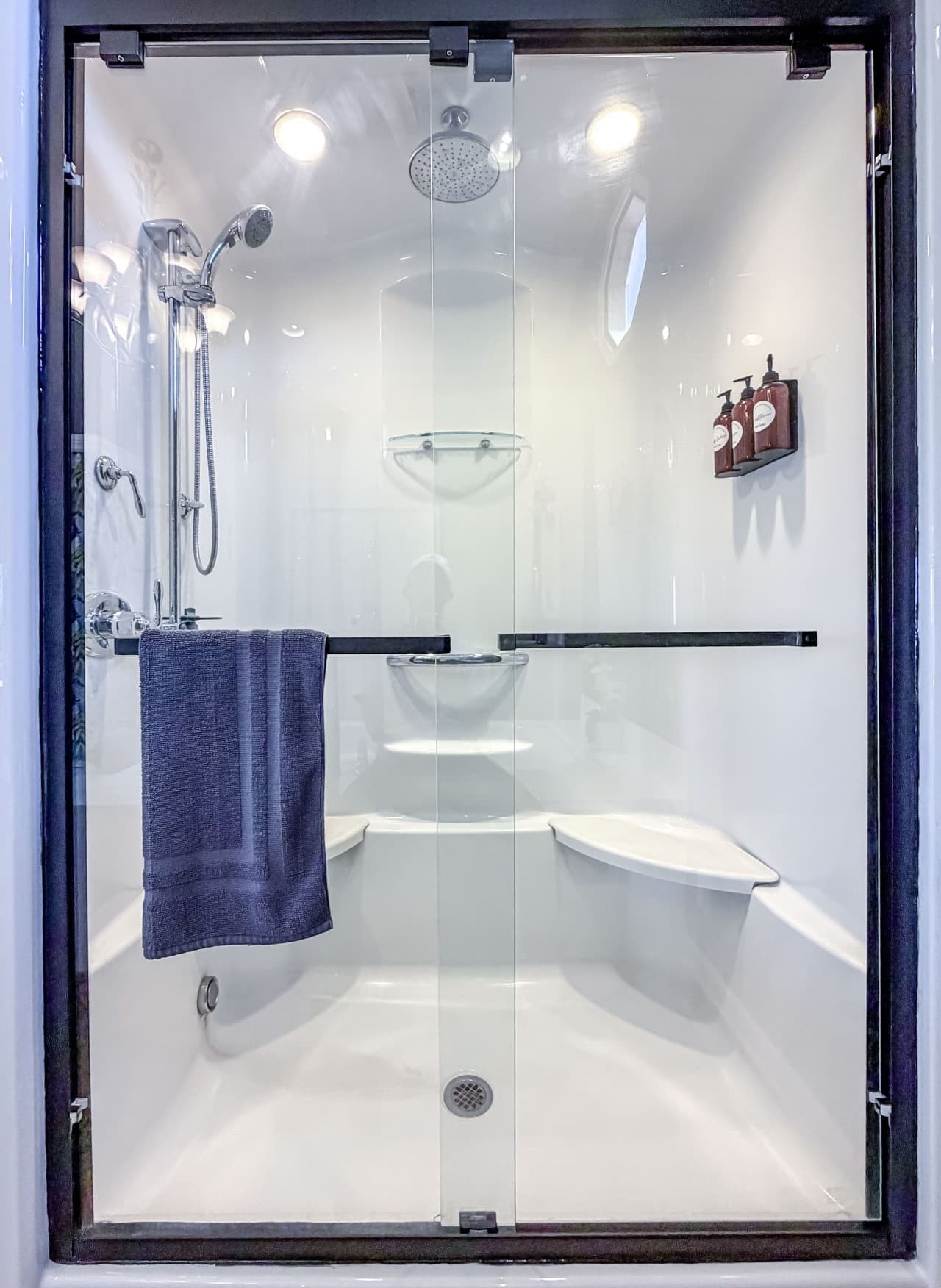 17-elyon-hall-primary-bath-rainfall-shower.jpg