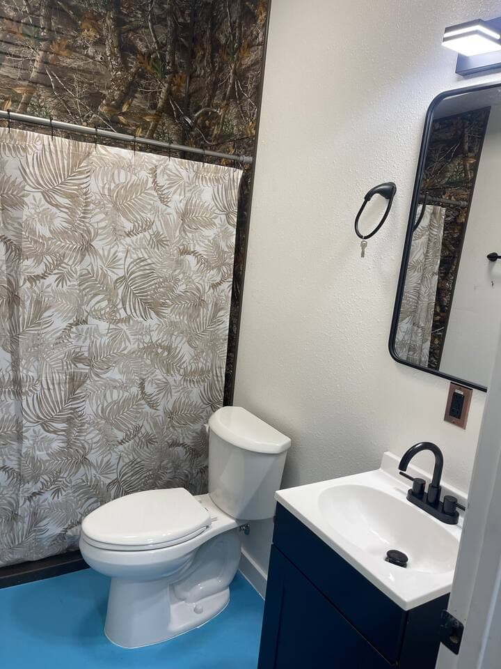 This is a shared bathroom and shower facility available for all guests. Please click the provided link to view the exact location and directions to the facility.
