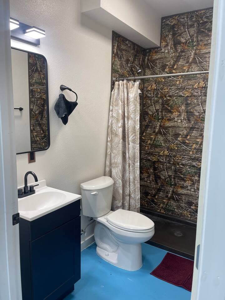 This is a shared bathroom and shower facility available for all guests. Please click the provided link to view the exact location and directions to the facility.
