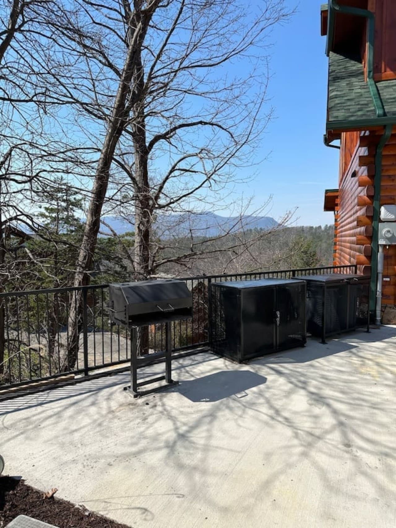 Charcoal grill available for use located on the front left side of the house