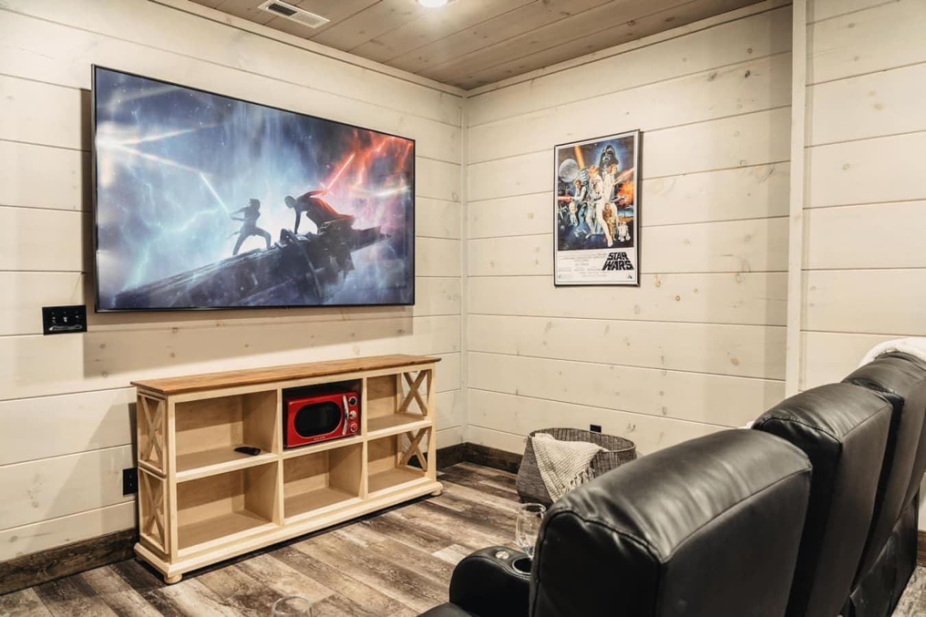 Theater Room (Downstairs) with large smart TV