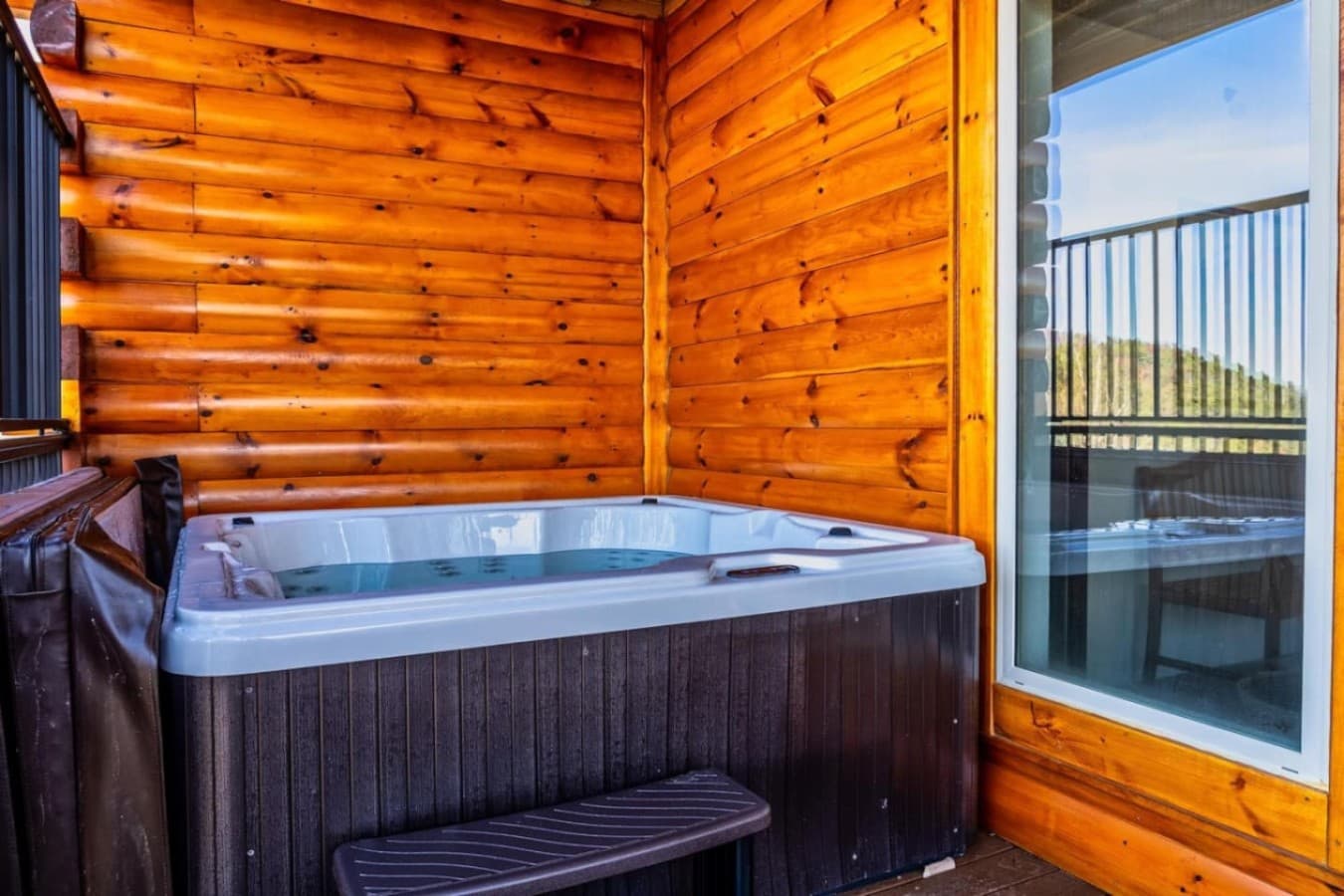 Hot tub available for use year-round, on the bottom floor