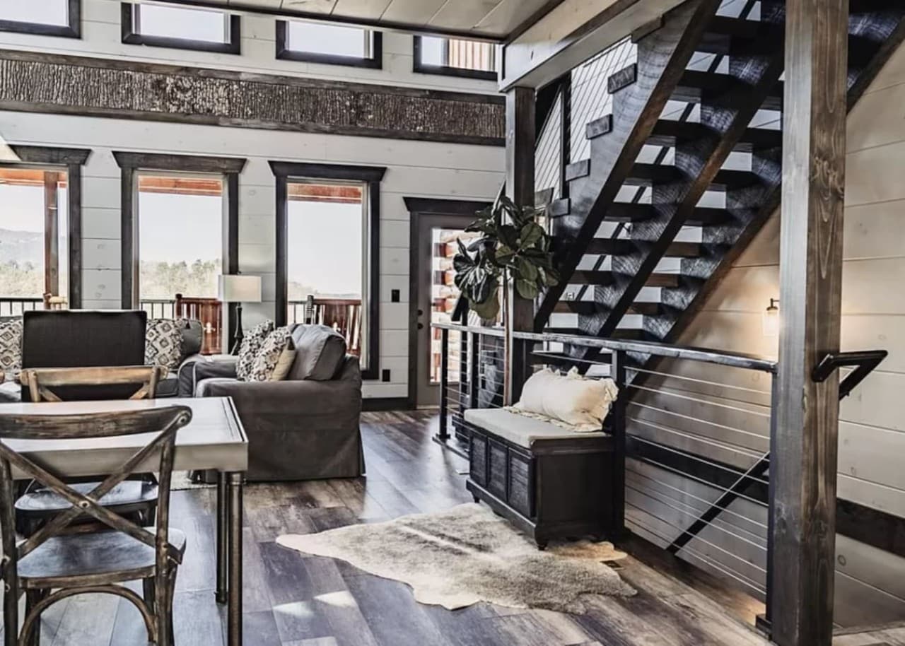 Off of the kitchen are stairs to go upstairs or downstairs