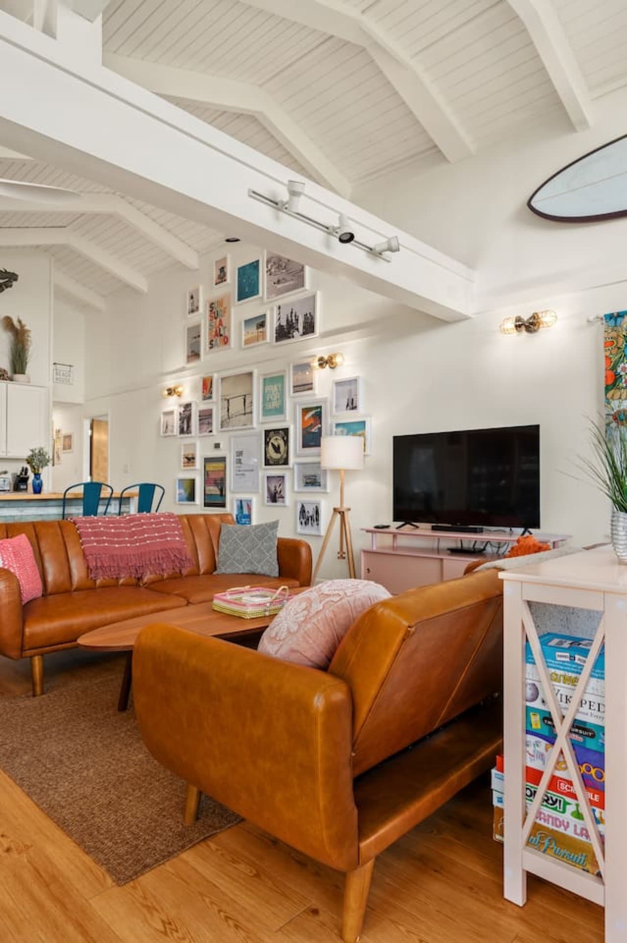 Cozy lounge setup w/ TV, layered textiles & a relaxed, lived-in vibe.