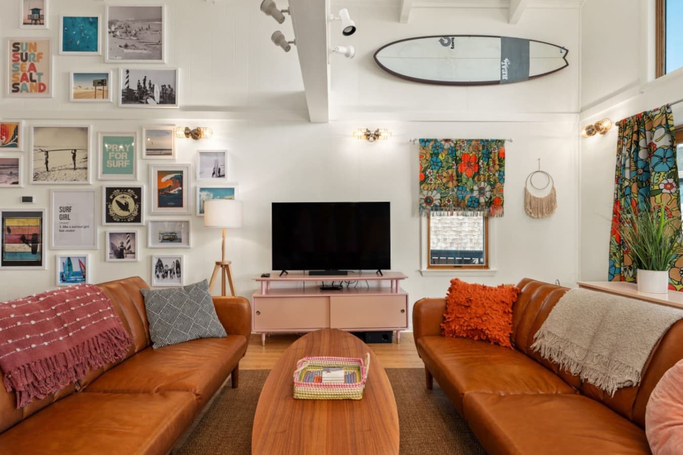 Central living space w/ plush sofas, wall art gallery & an easygoing hangout feel.