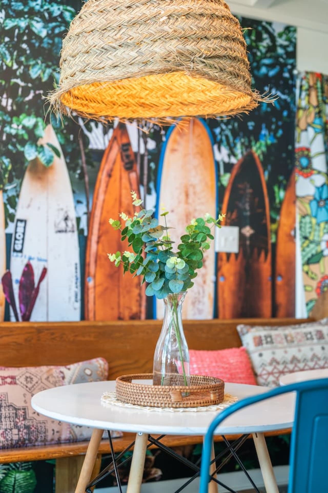 Close-up details of warm wood, plants & coastal textures that add natural charm.
