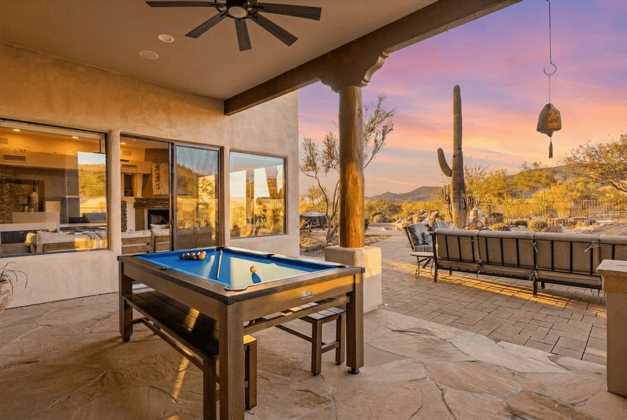 The multi funtion table on our covered patio area will give you hours of use and enjoyment for your group.