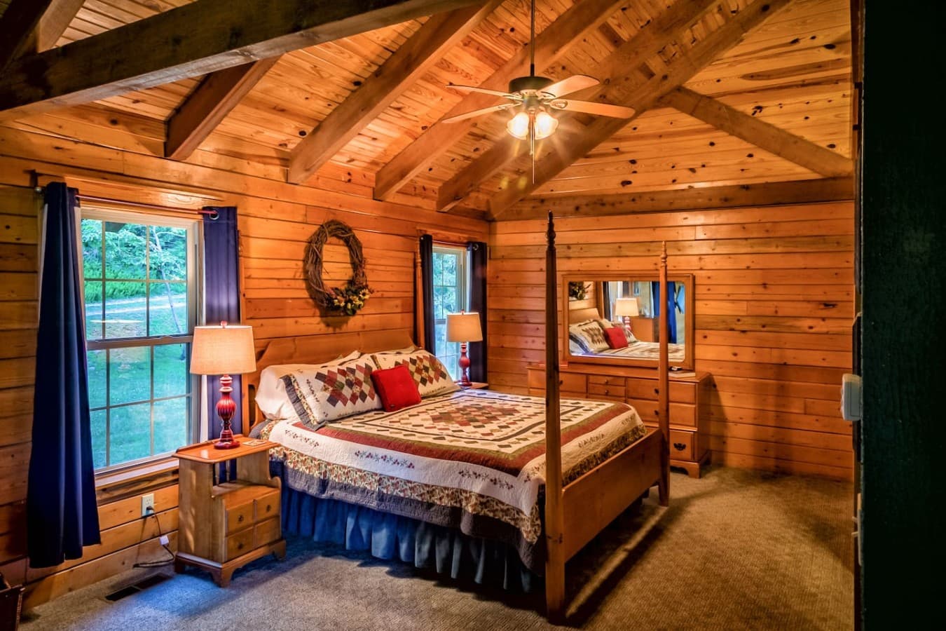 King Size bed looking through bath to lake