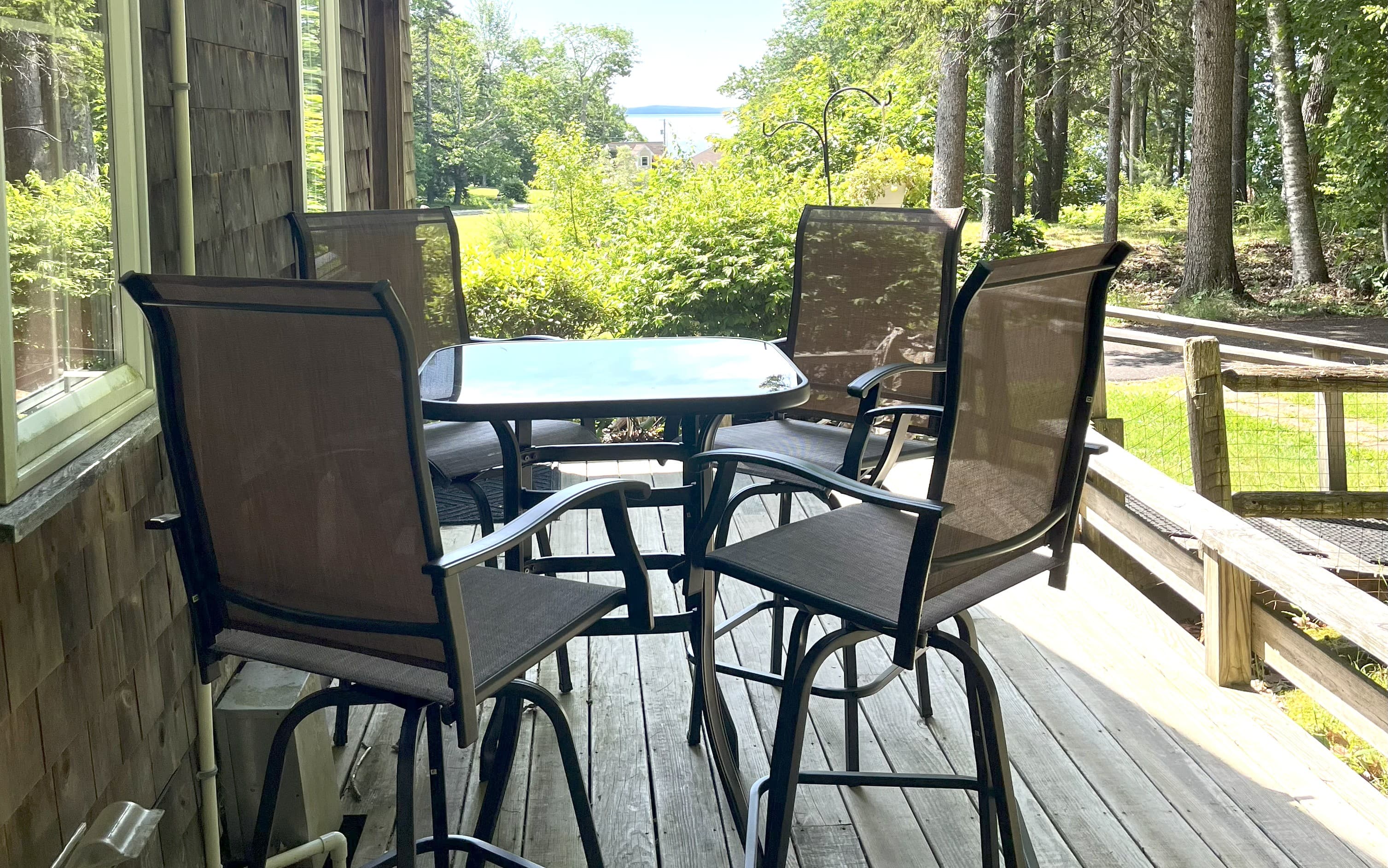 Outdoor patio dining set on the dec, perfect for morning coffee or lobster dinner.