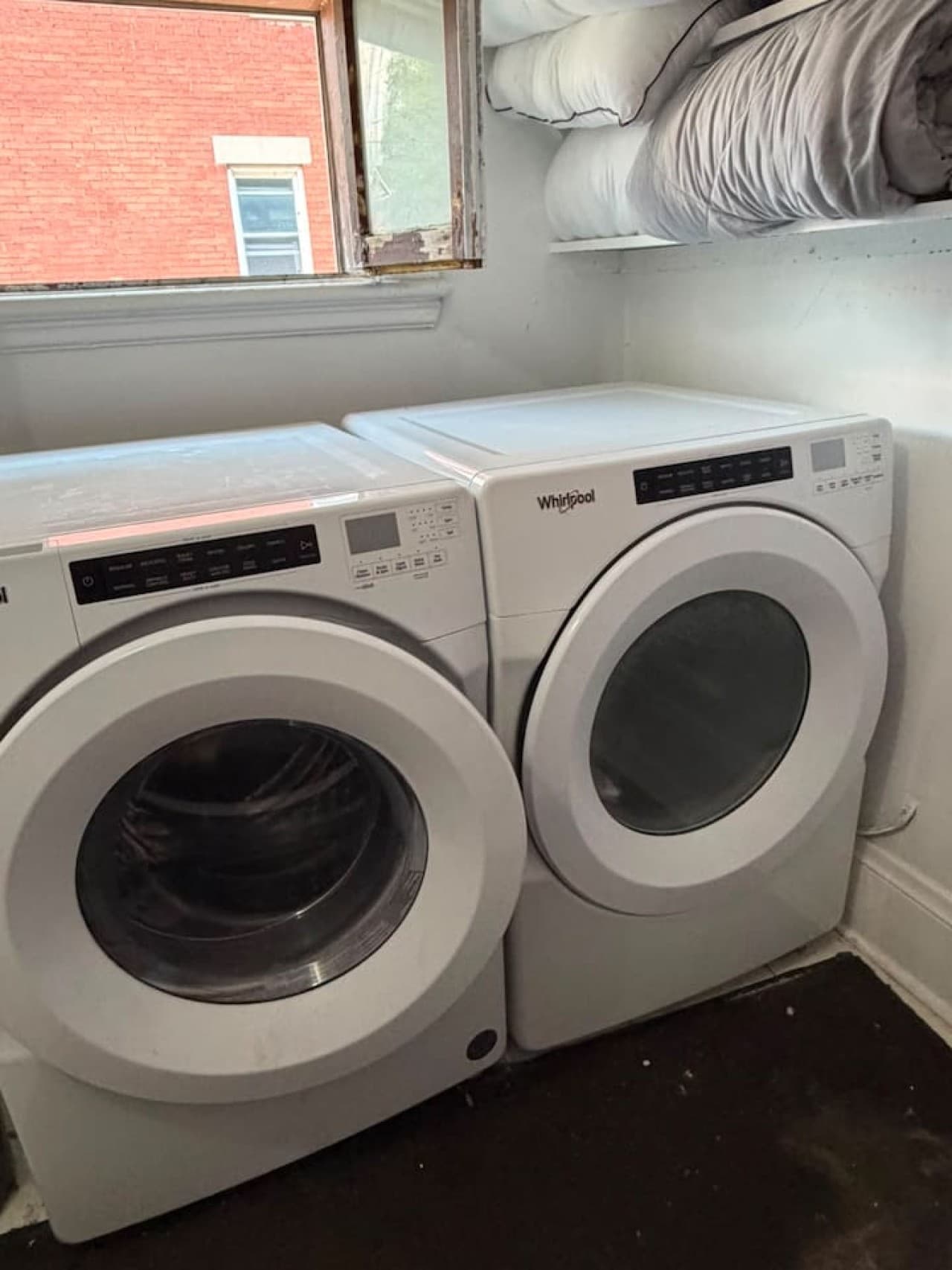 This laundry area is just down the hall. It is not inside the unit